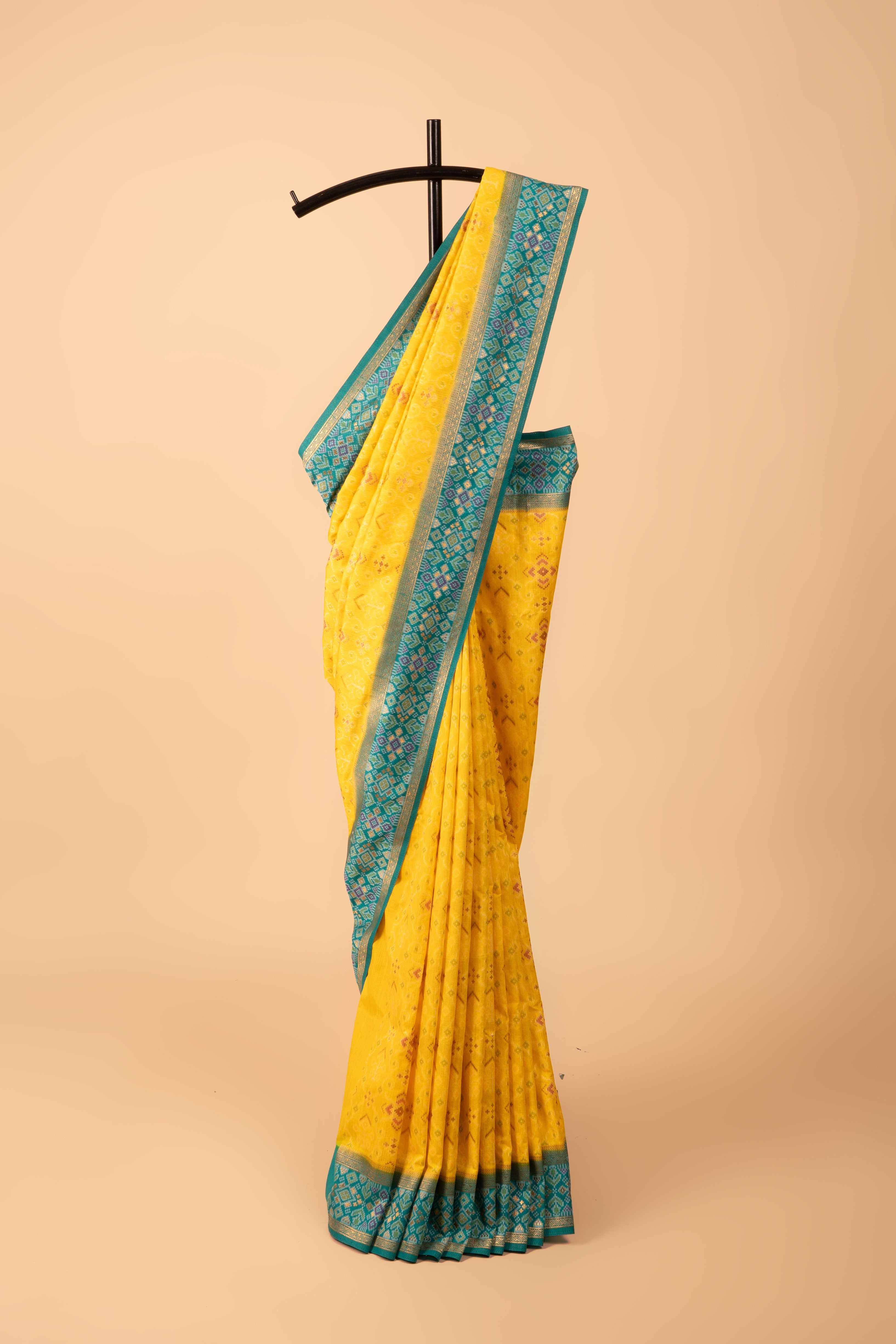 Yellow Tussar Silk Patola Saree with contrast Sea Green border