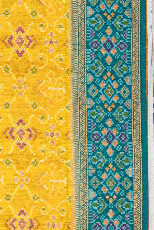 Yellow Tussar Silk Patola Saree with contrast Sea Green border