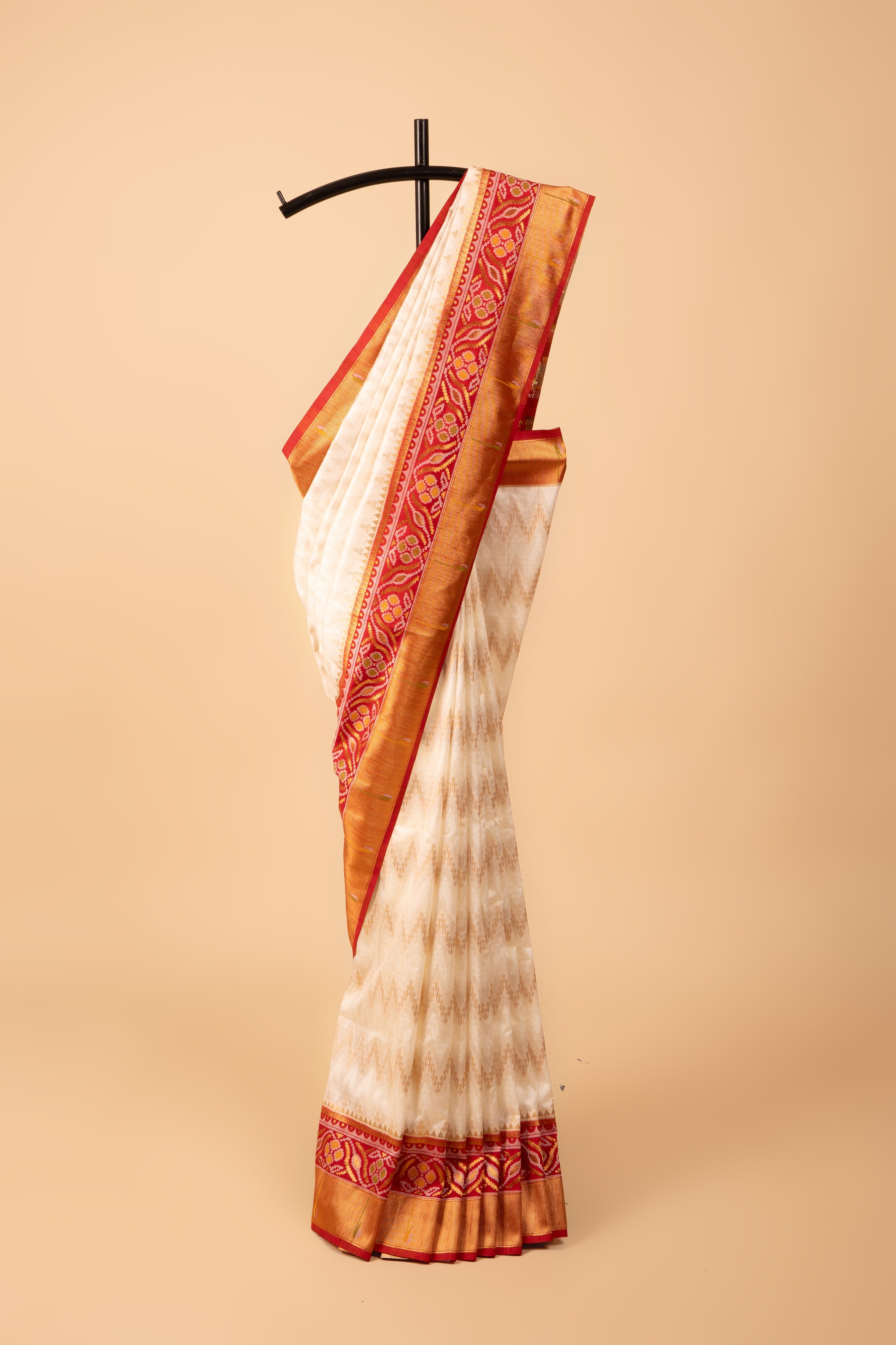 White Tussar Silk Patola Saree with contrast Red border