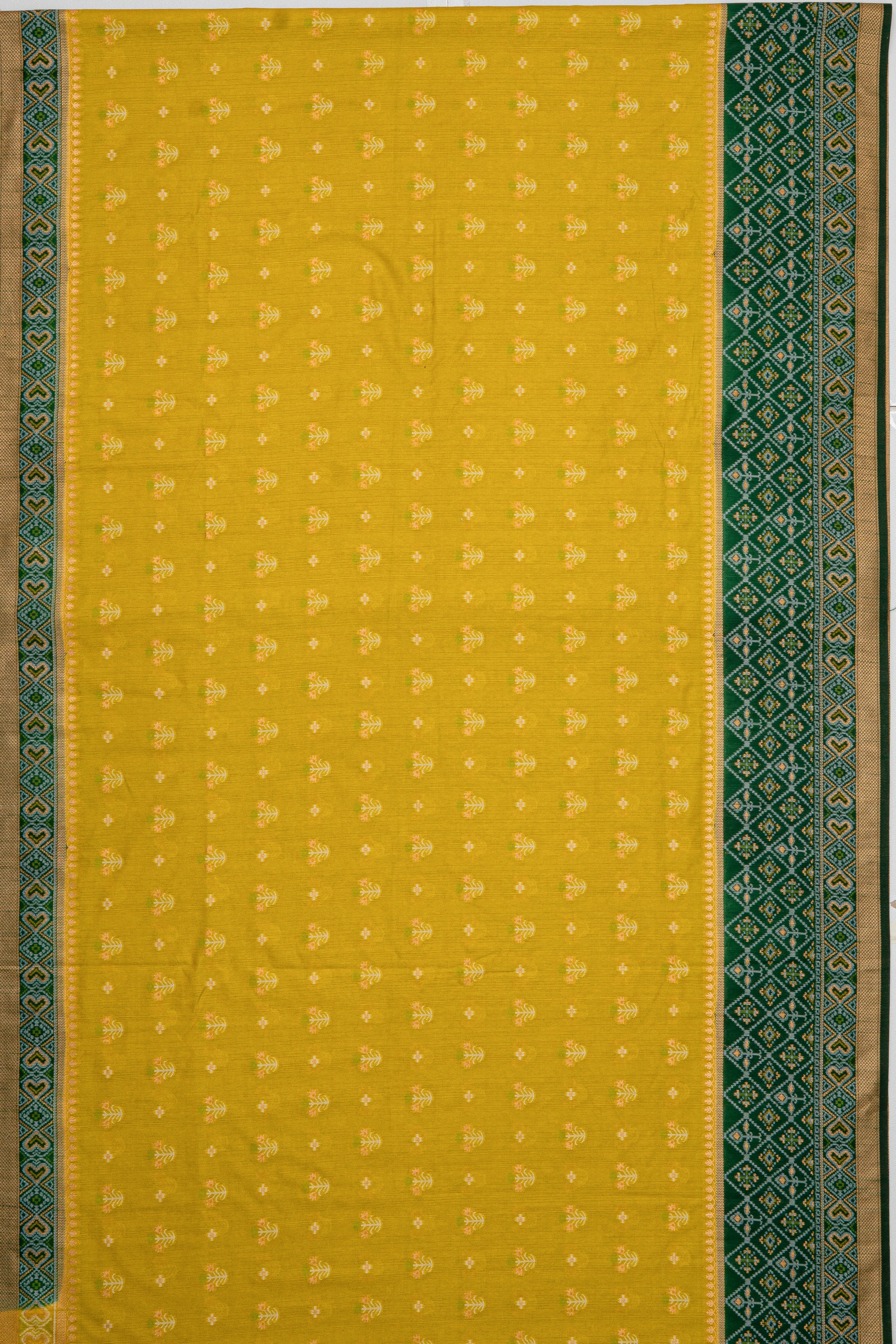 Mehndi Green Tussar Silk Patola Saree with contrast Dark Green border