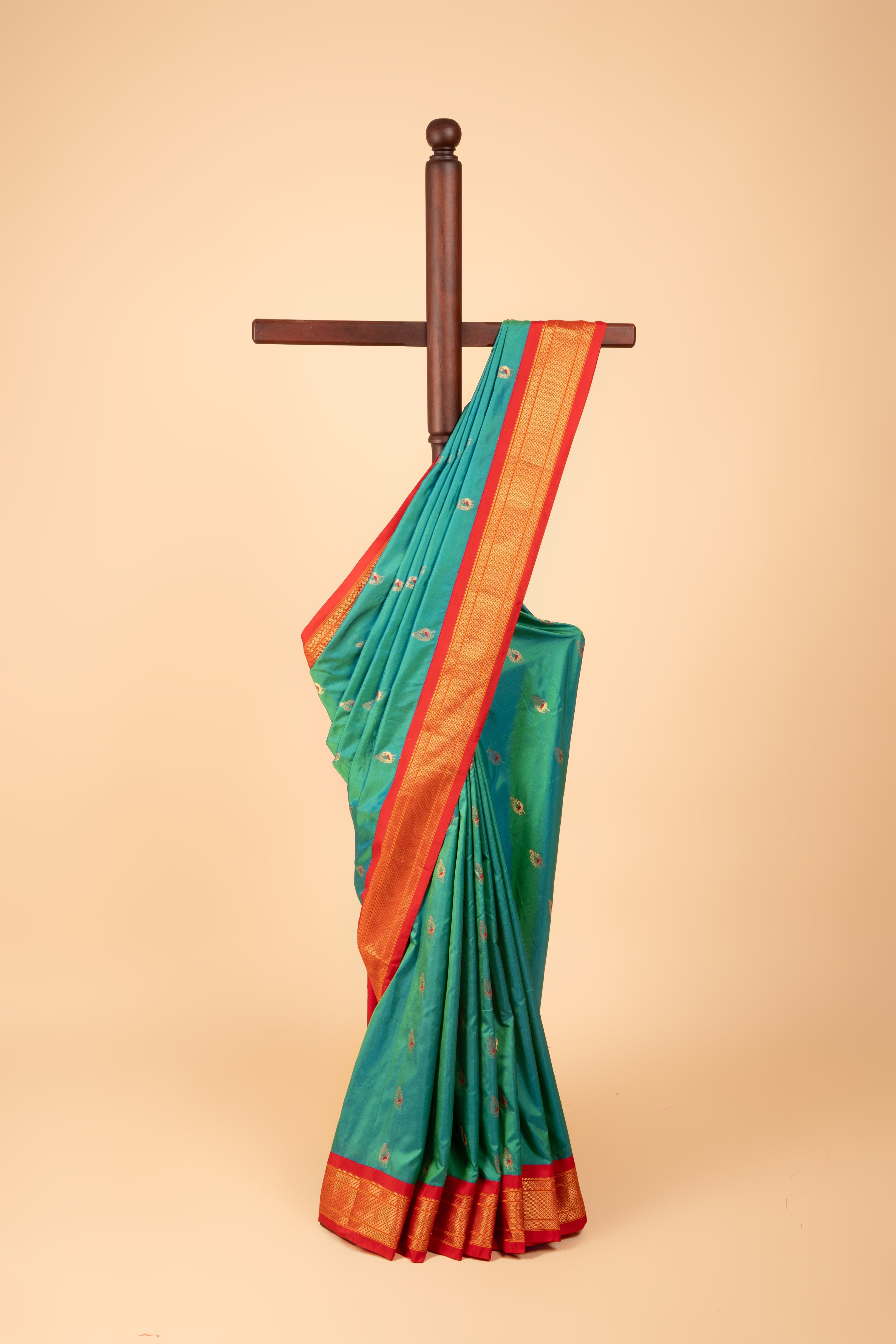 Sea Green Pure Silk Kadiyal Paithani Saree with contrast Red Chattai border and Peacock motifs