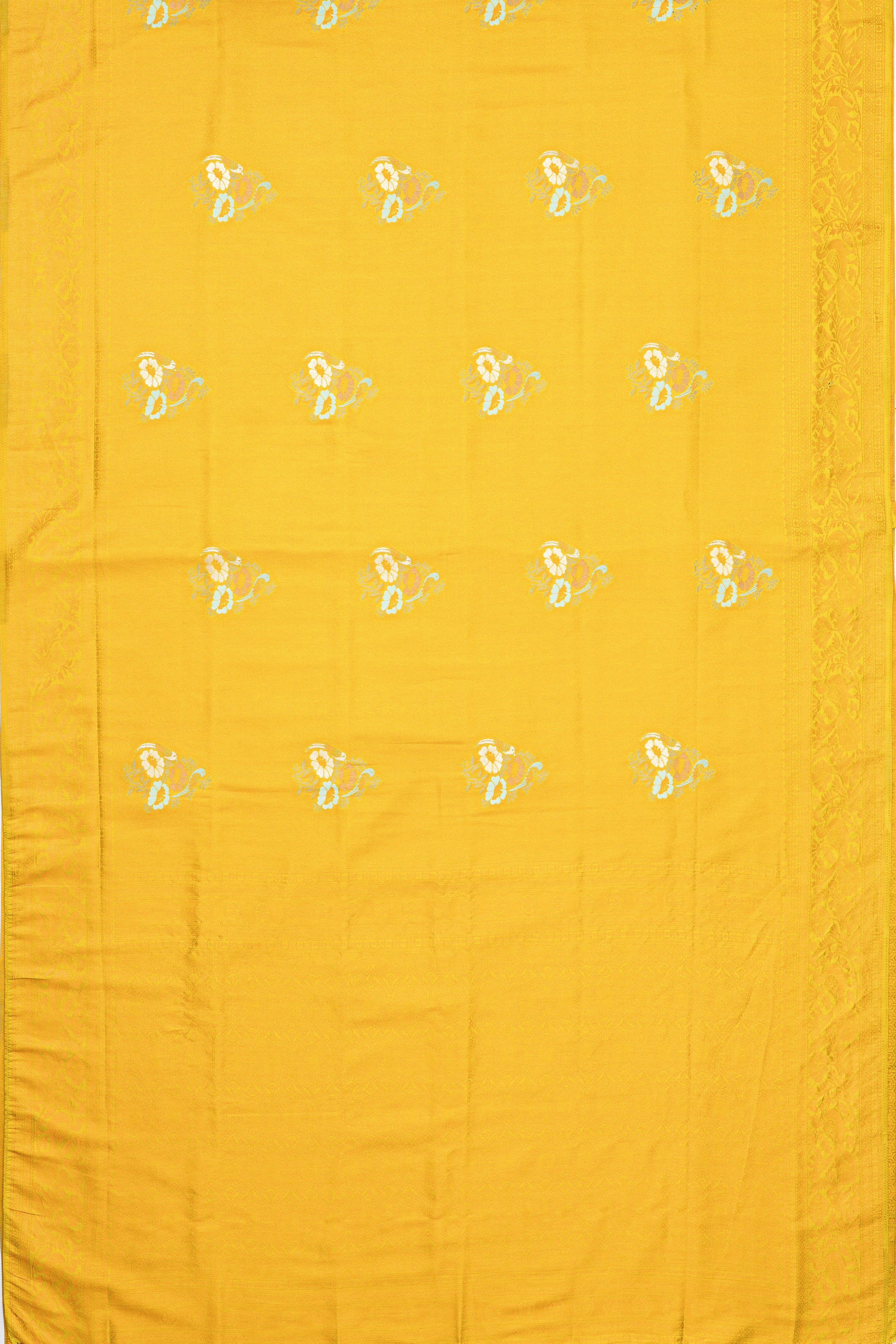 Yellow Soft Silk Saree with Floral motifs