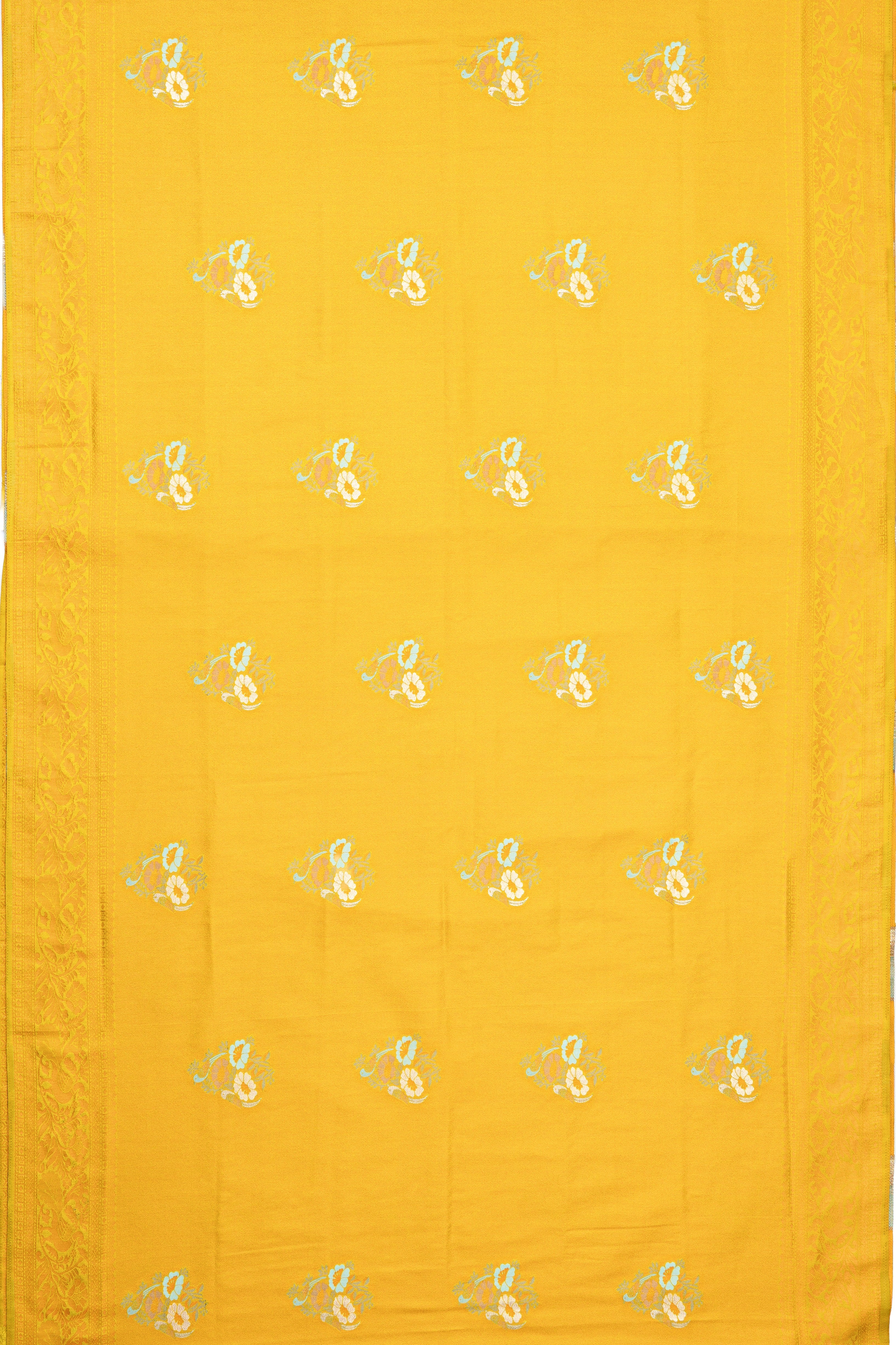 Yellow Soft Silk Saree with Floral motifs