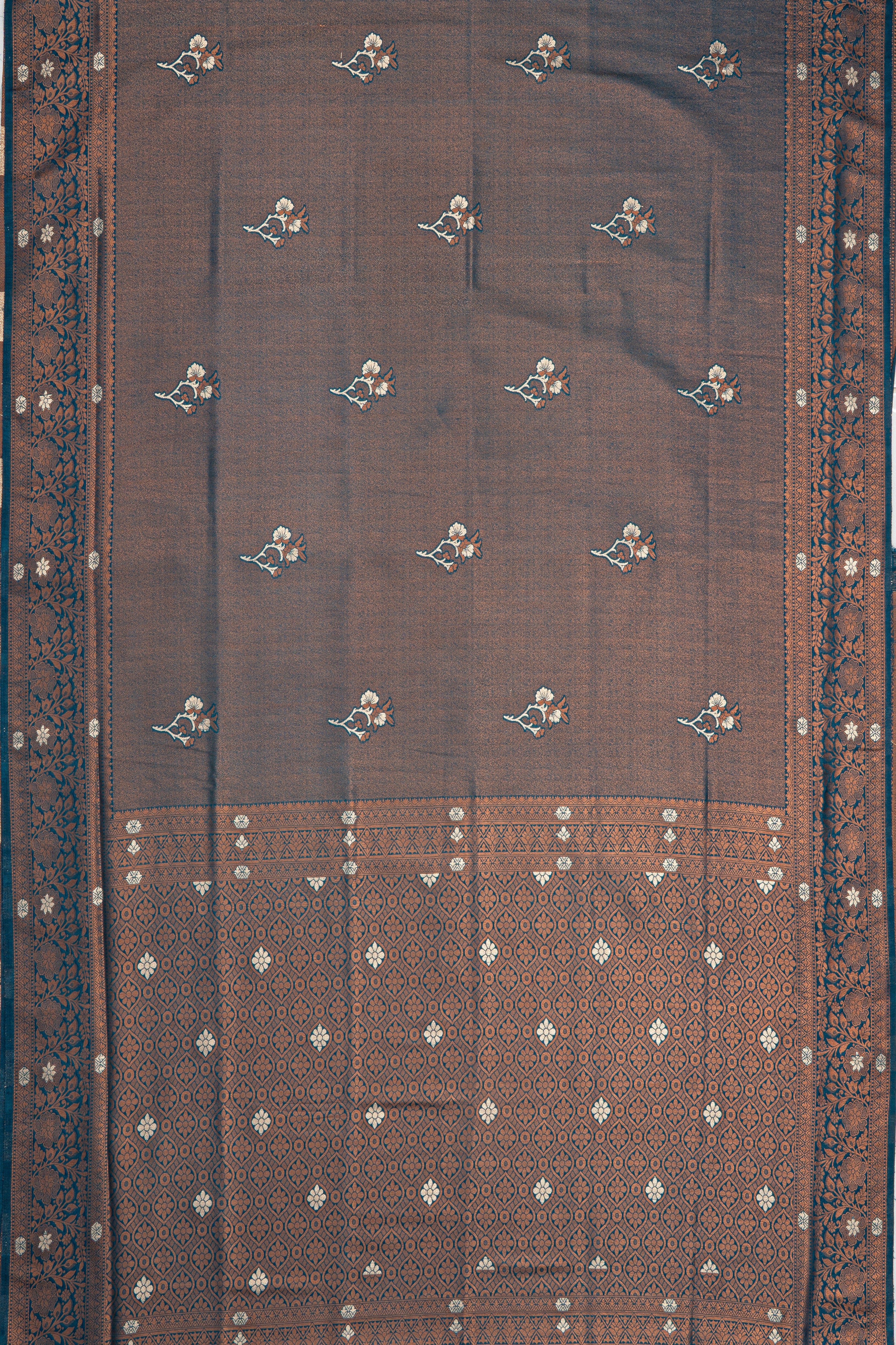 Dhoop Chaon Copper Blue Soft Silk Saree with Gold and Silver Floral motifs