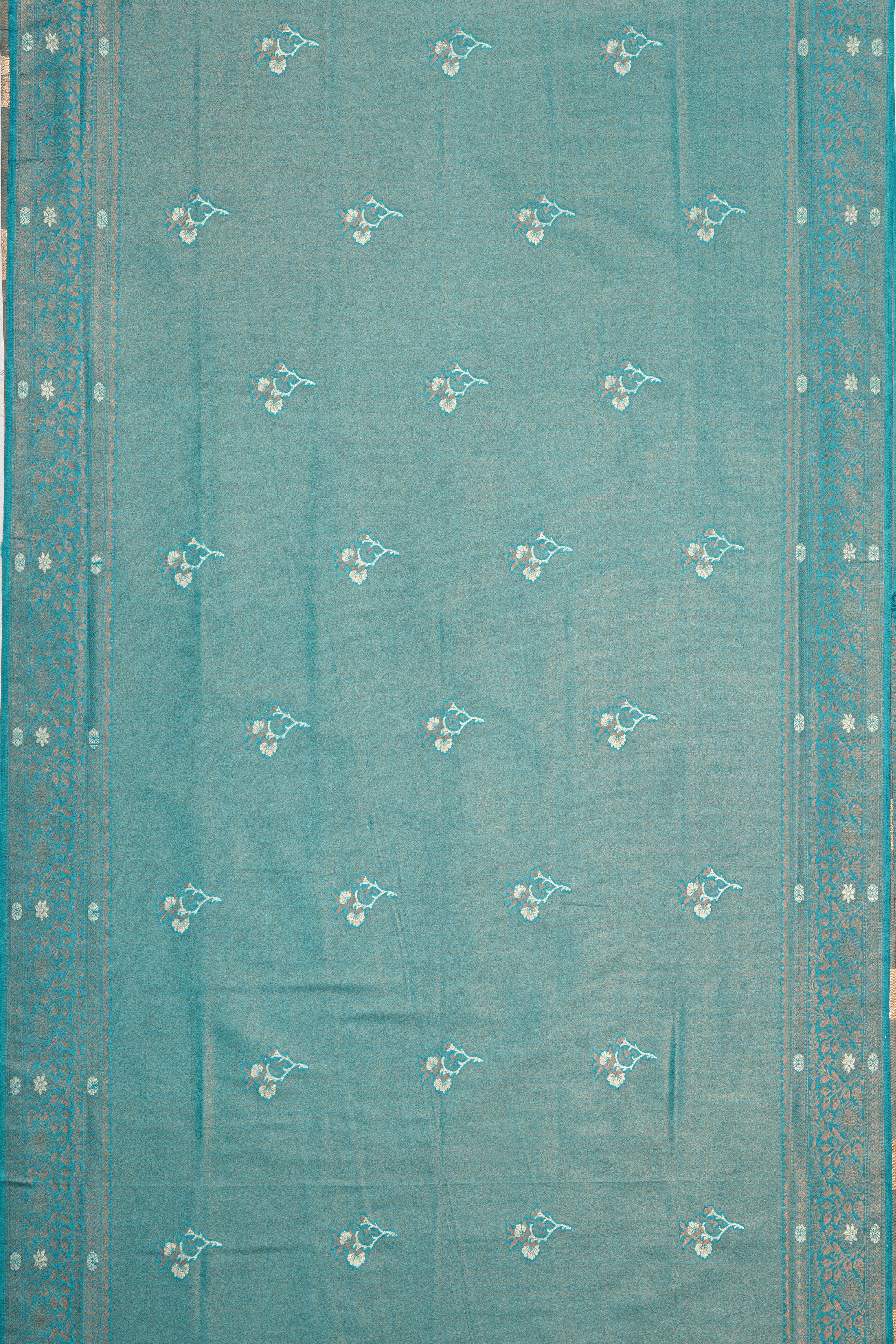 Sea Green Soft Silk Saree with Gold and Silver Zari Floral motifs