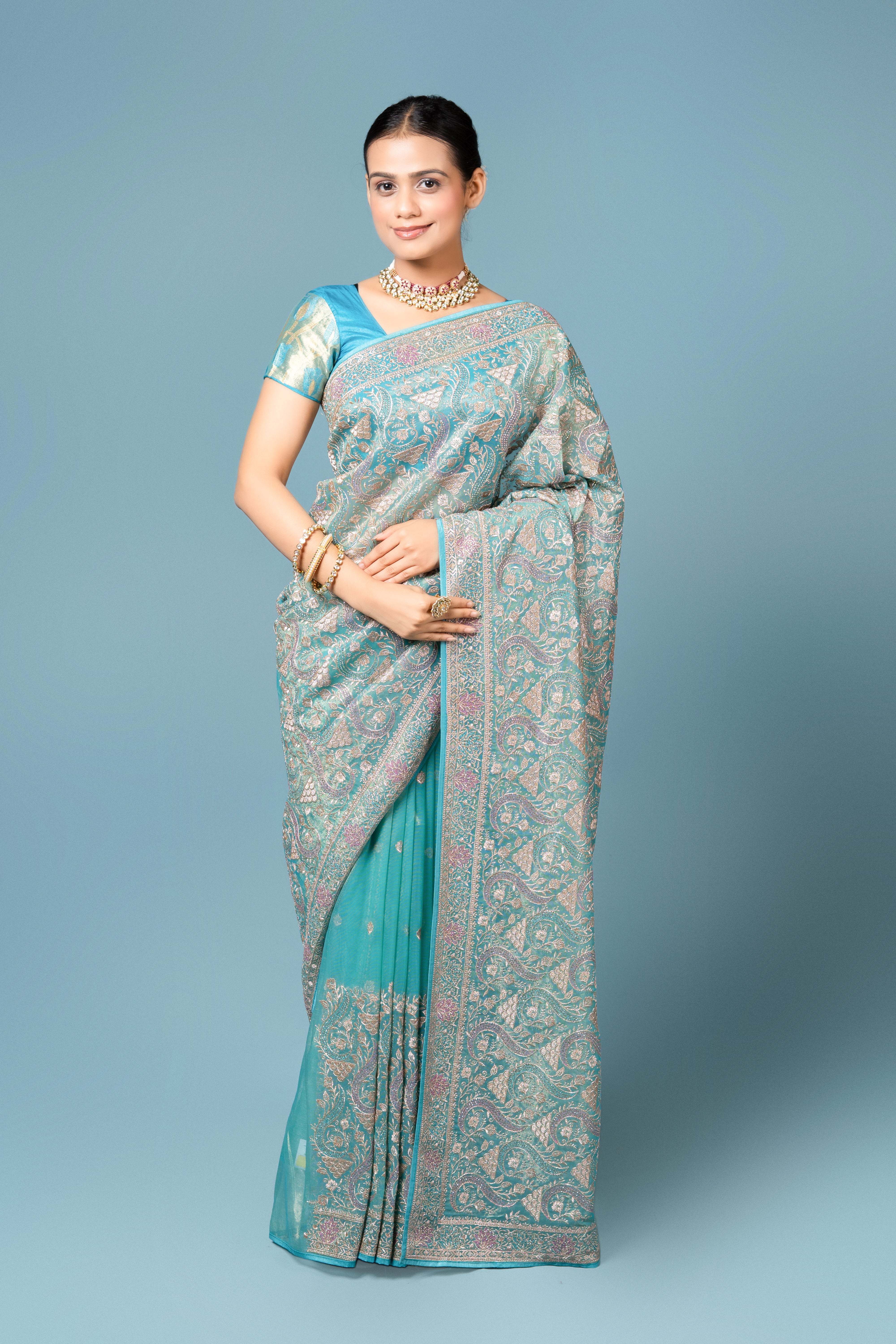 Turquoise Georgette Saree With Stone Work