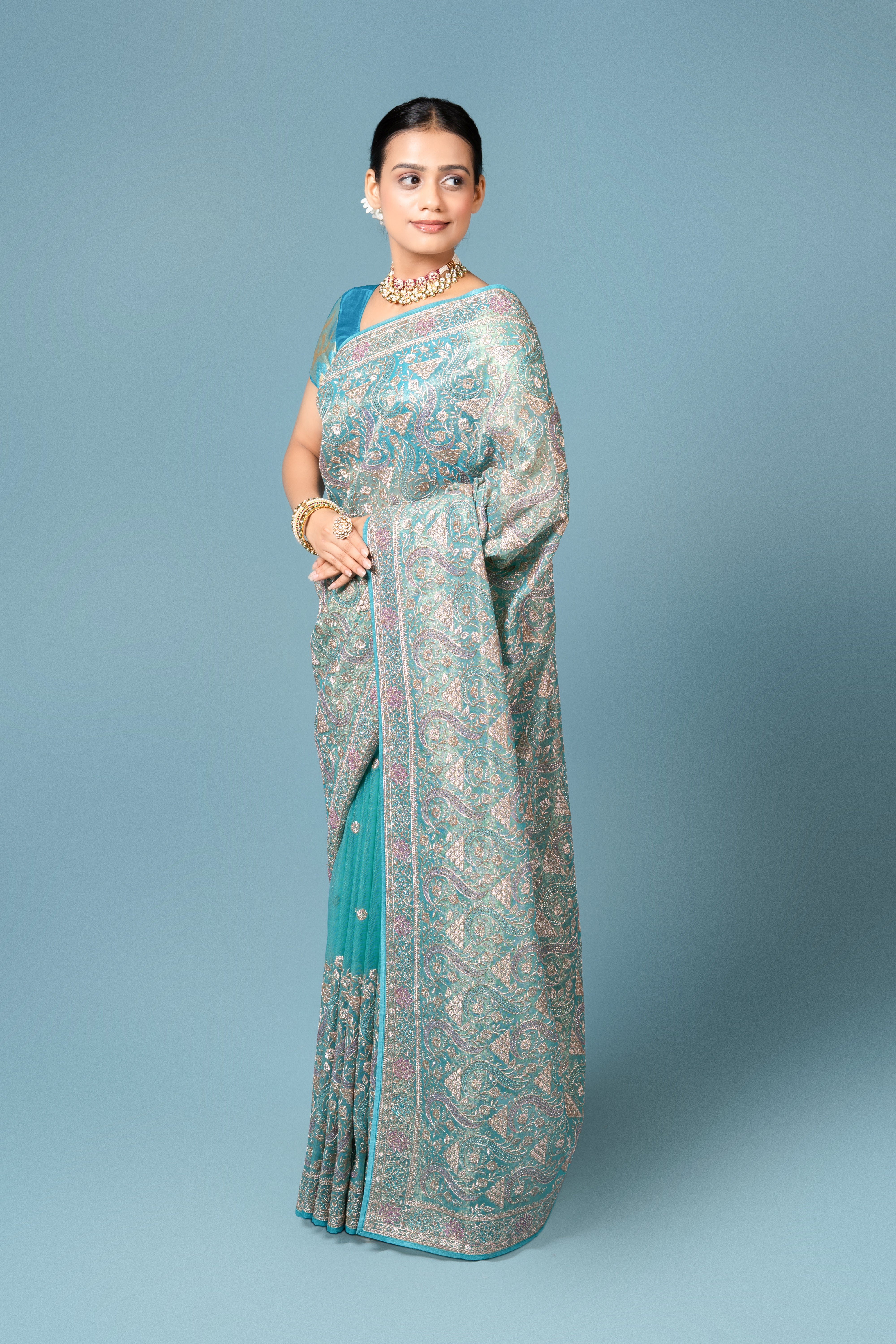 Turquoise Georgette Saree With Stone Work