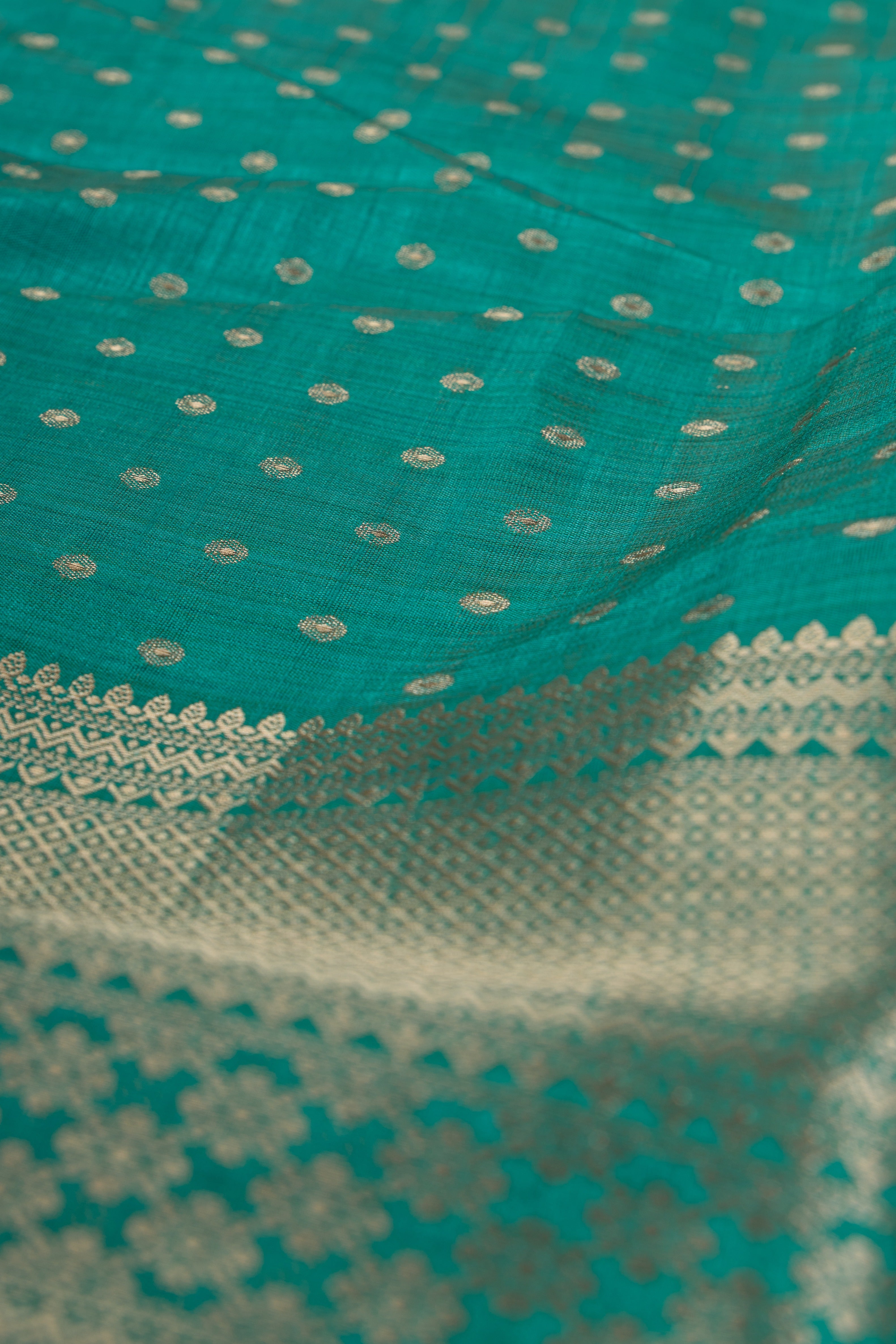 Sea Green Tussar Silk Banarasi Saree with heavy Gold Zari border