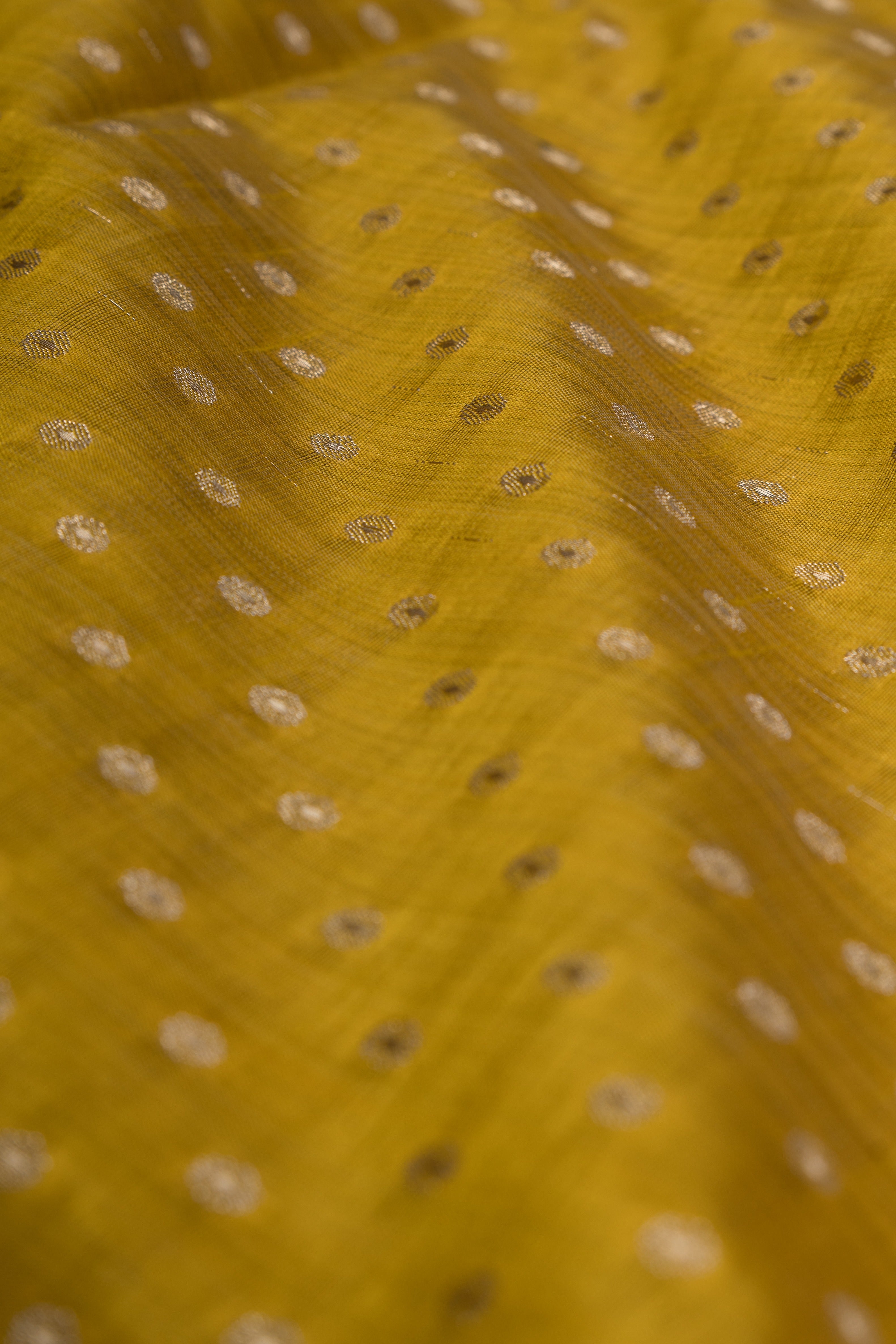 Haldi Yellow Tussar Silk Banarasi Saree with Gold Zari border and butti