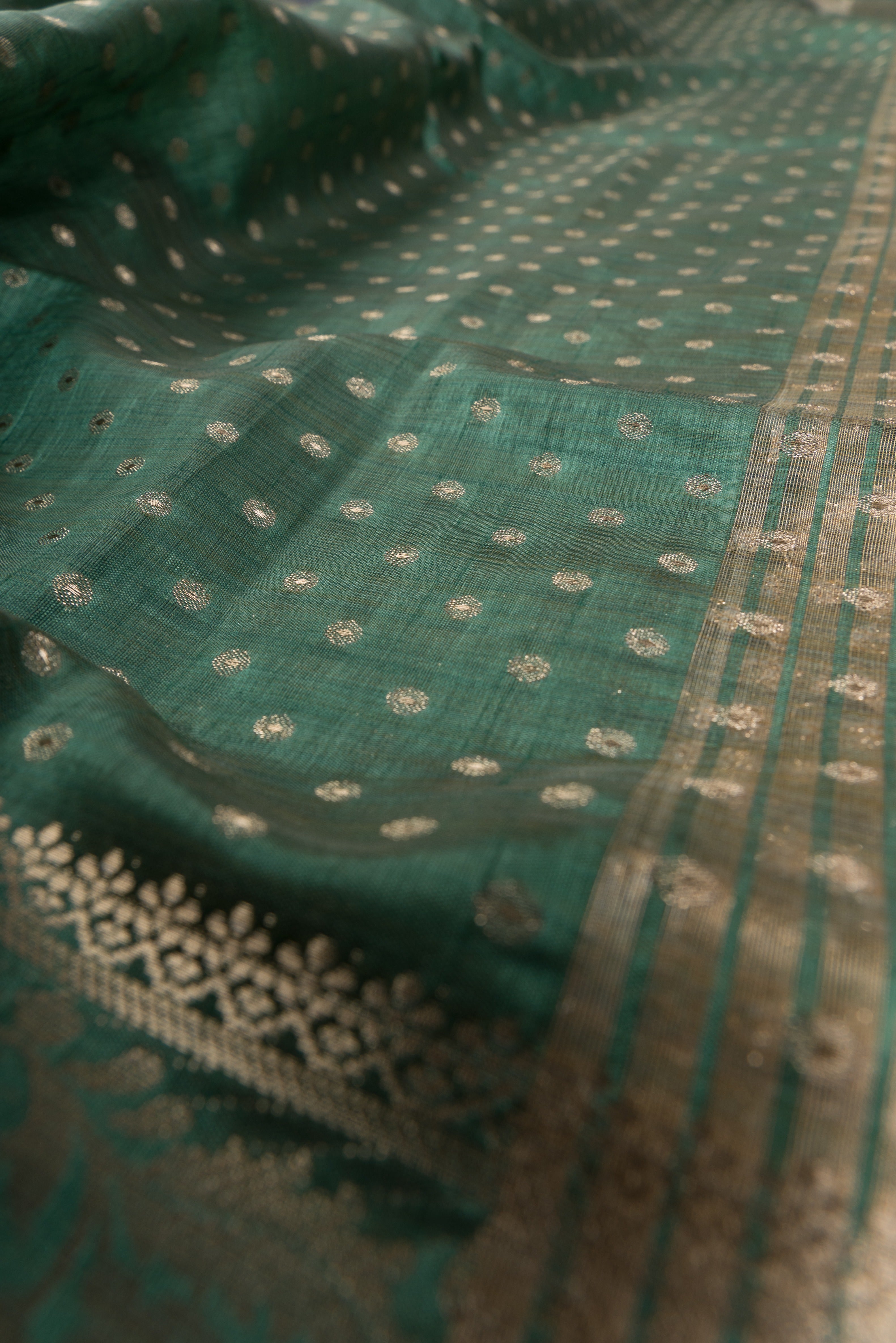 Forest Green Tussar Silk Banarasi Saree with heavy Gold Zari border