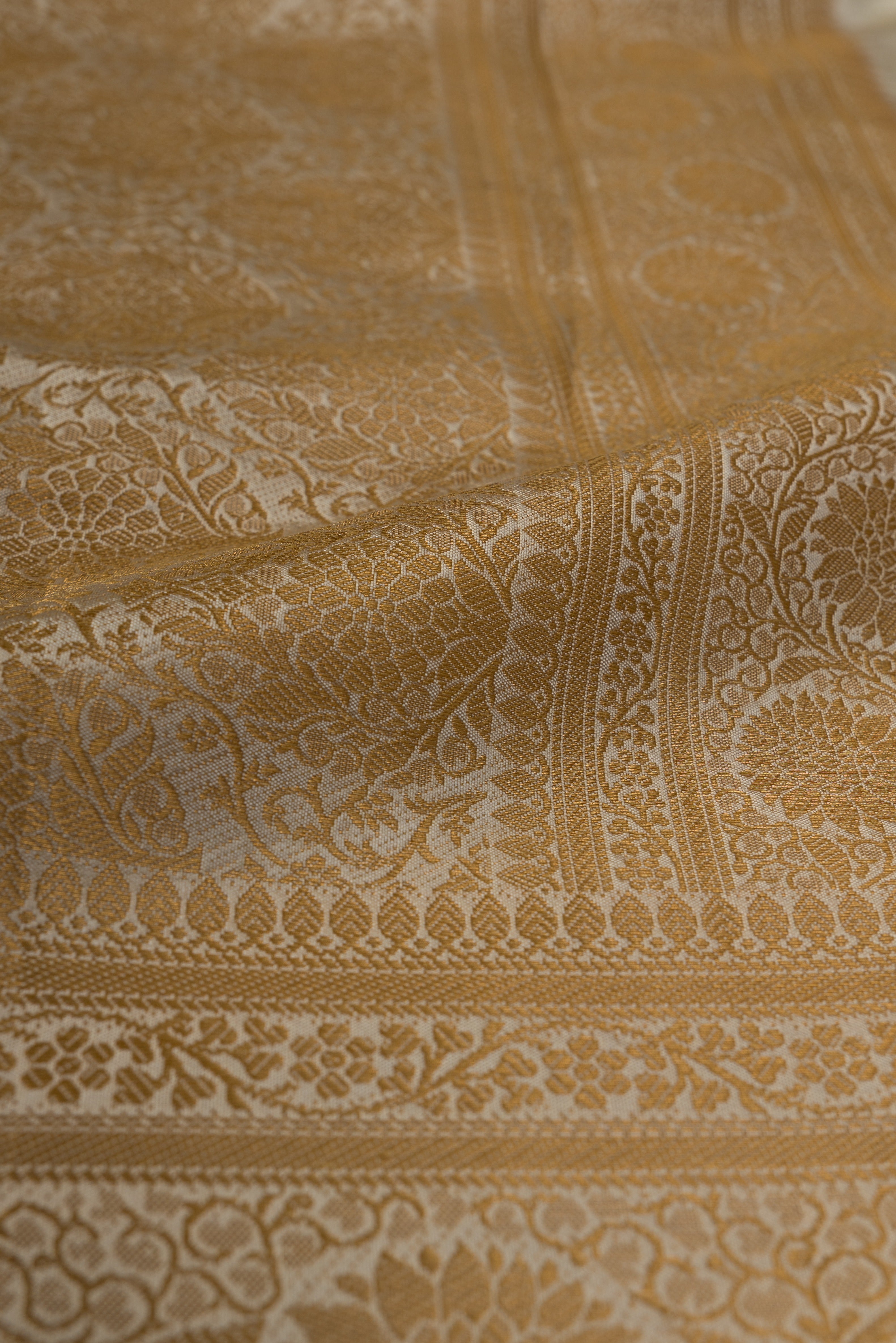Pearl White Katan Silk Banarasi Saree with Statement Gold Zari Floral Border