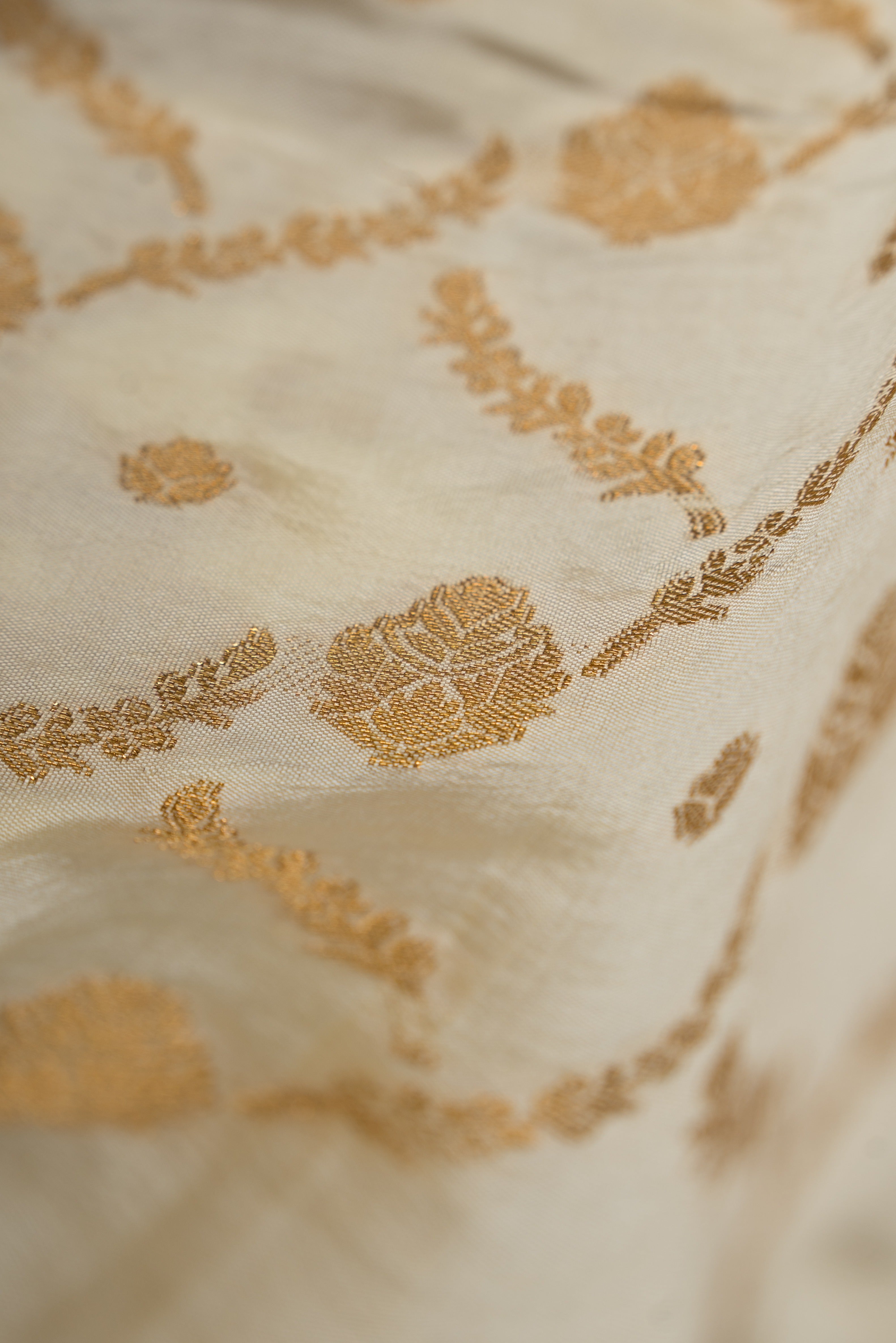 Pearl White Katan Silk Banarasi Saree with Statement Gold Zari Floral Border