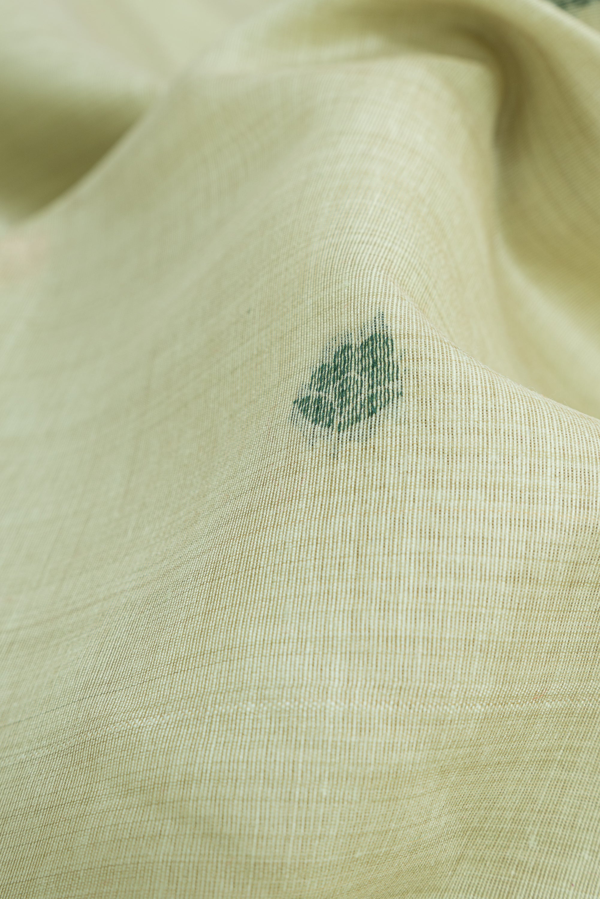 Pastel Green Cotton Paithani Saree with Mṛgataru-Padmāvalī Pallu and contrast Forest Munya border