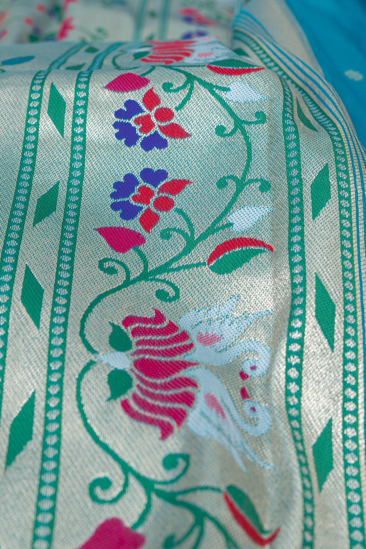 Neelamani Blue Apurva Silk Paithani Saree with Star Meena butti, and Rajhans Pallu