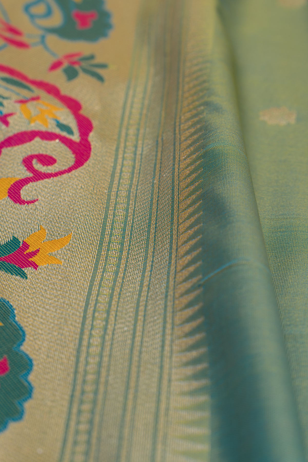 Pastel Green Apurva Silk Paithani Saree with Sitaara butti, Muniya border and Resham threadwork Floral Pallu