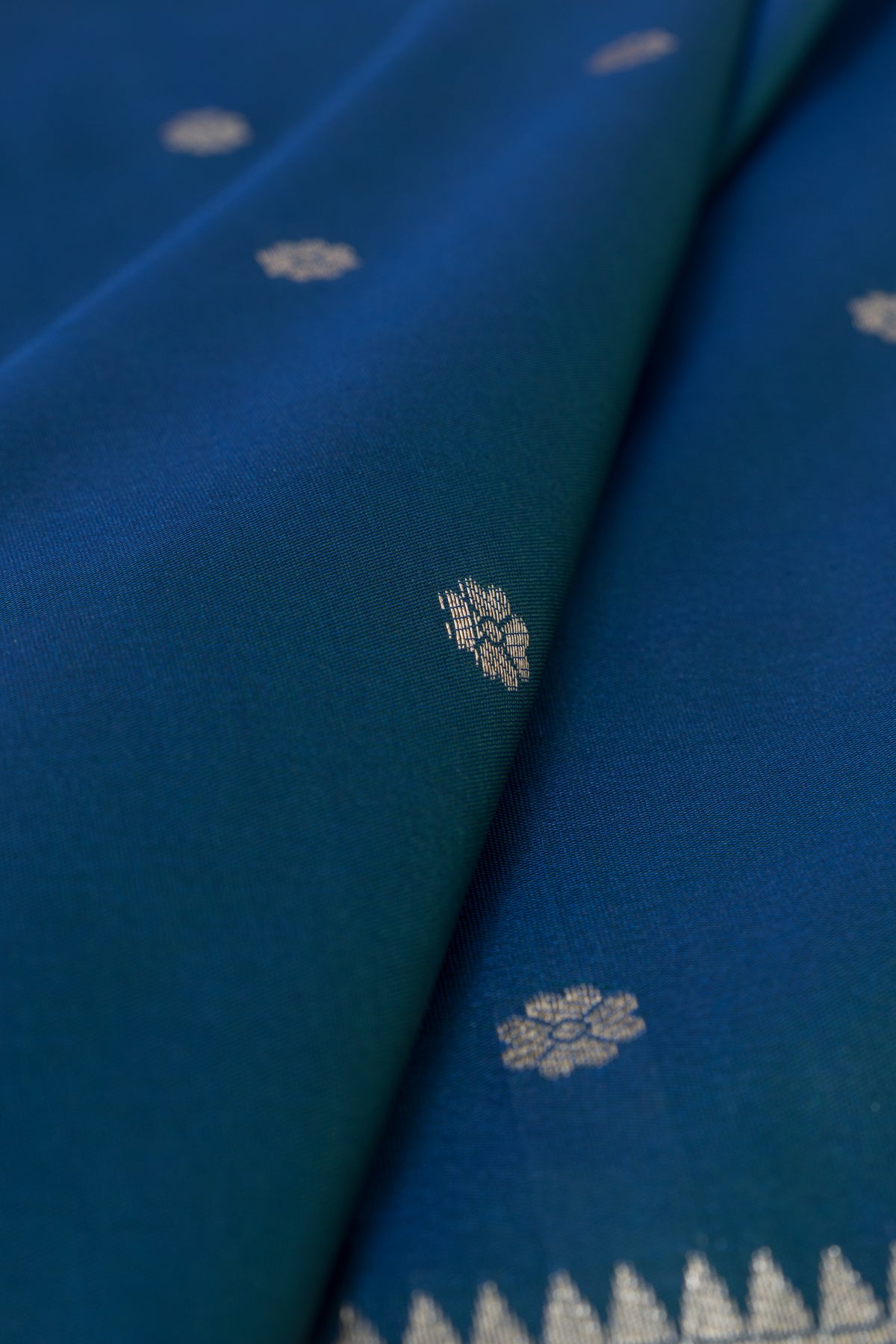 Peacock Blue Apurva Silk Paithani Saree with Sitaara butti, Muniya border and Resham threadwork Floral Pallu