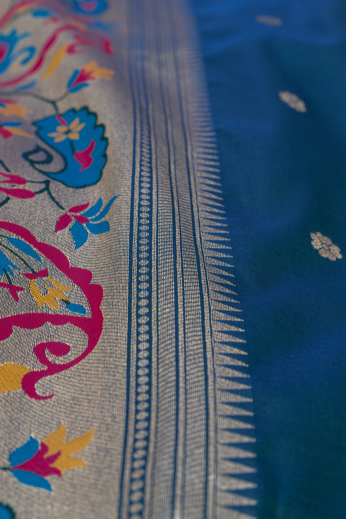 Peacock Blue Apurva Silk Paithani Saree with Sitaara butti, Muniya border and Resham threadwork Floral Pallu