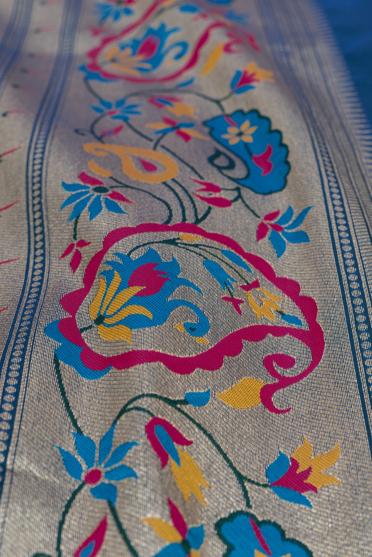 Peacock Blue Apurva Silk Paithani Saree with Sitaara butti, Muniya border and Resham threadwork Floral Pallu