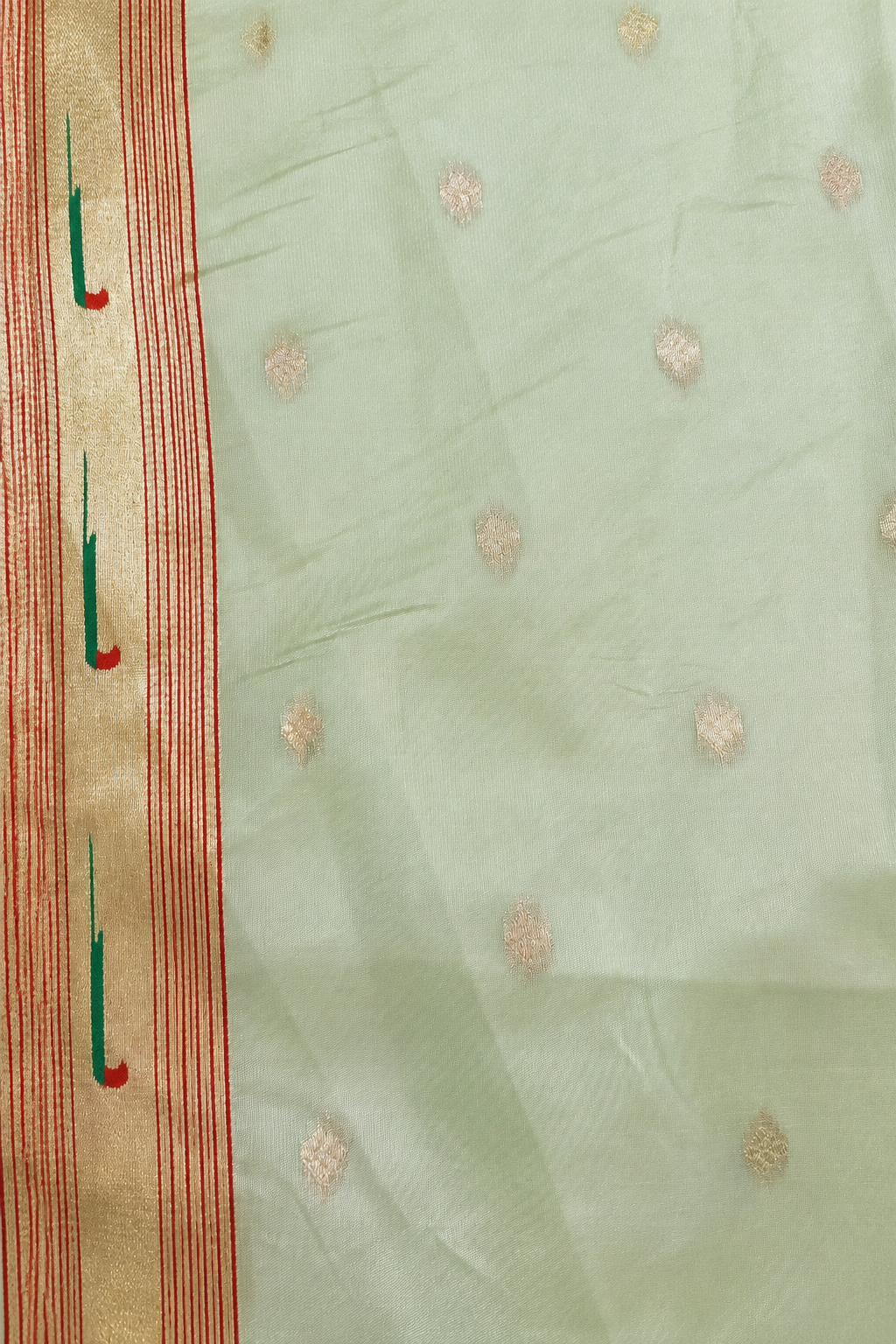 Pastel Green Tissue Organza Paithani Saree with Dhenu-vallī Pallu and Nandi border