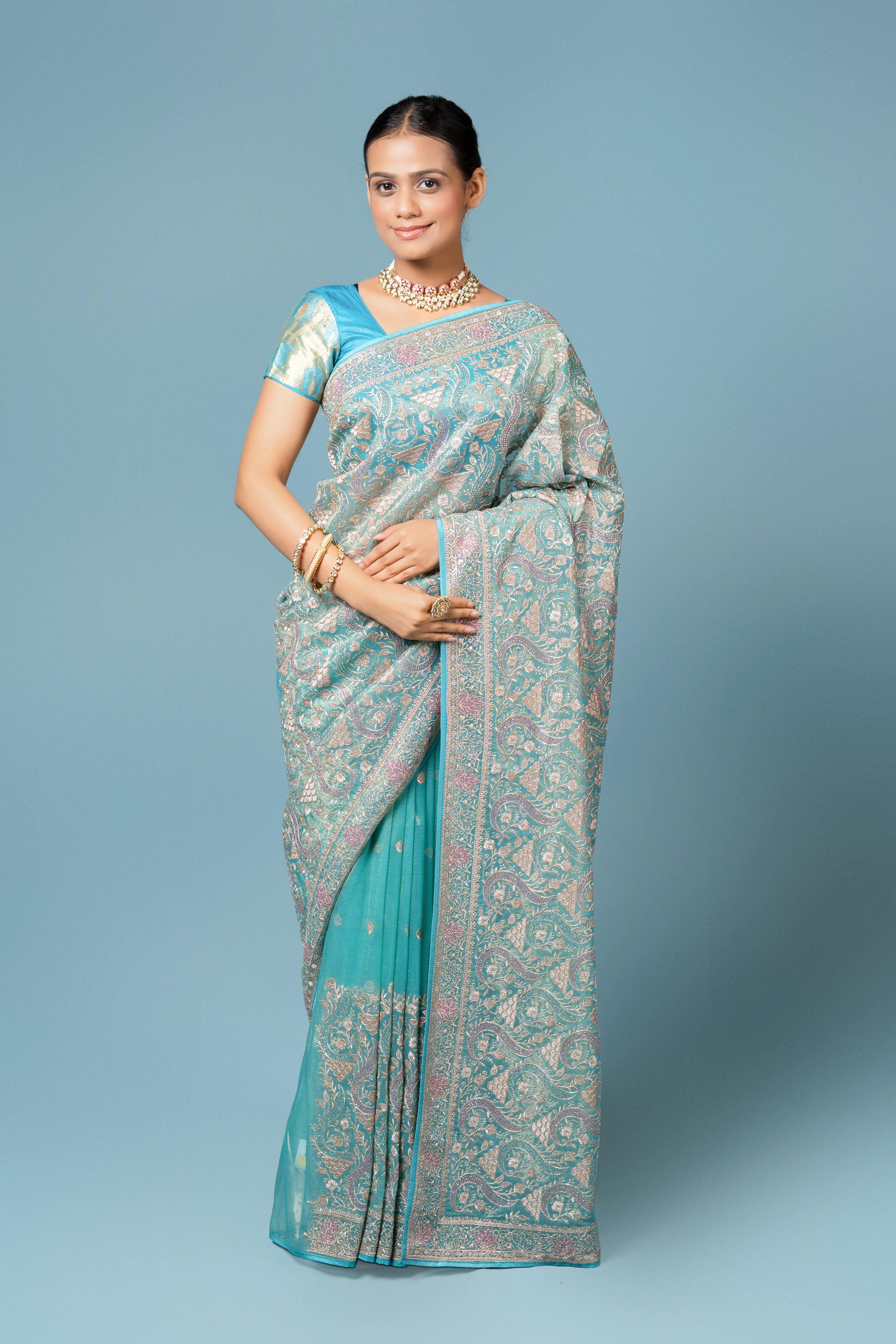 Turquoise Georgette Saree with Stone Work