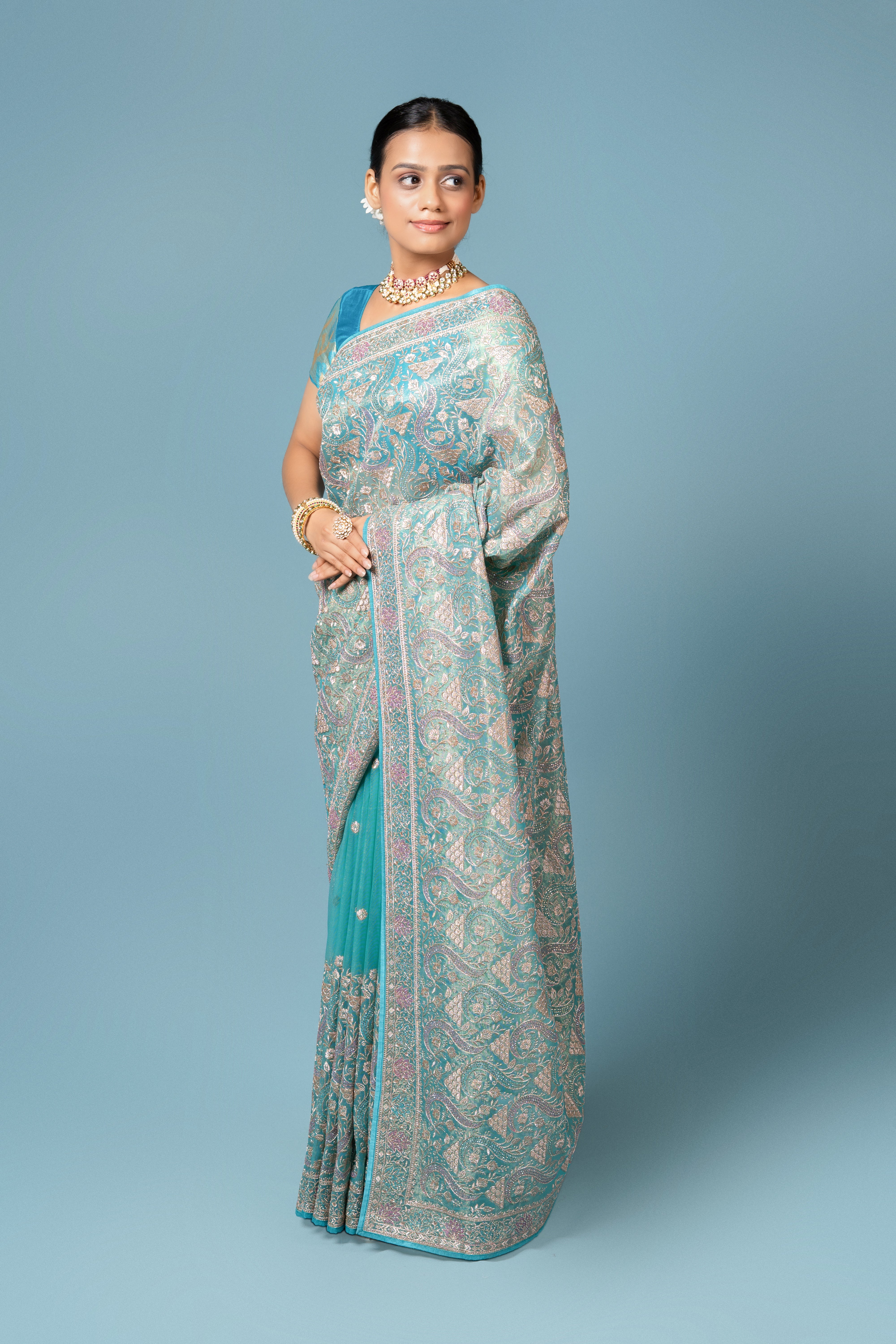 Turquoise Georgette Saree with Stone Work