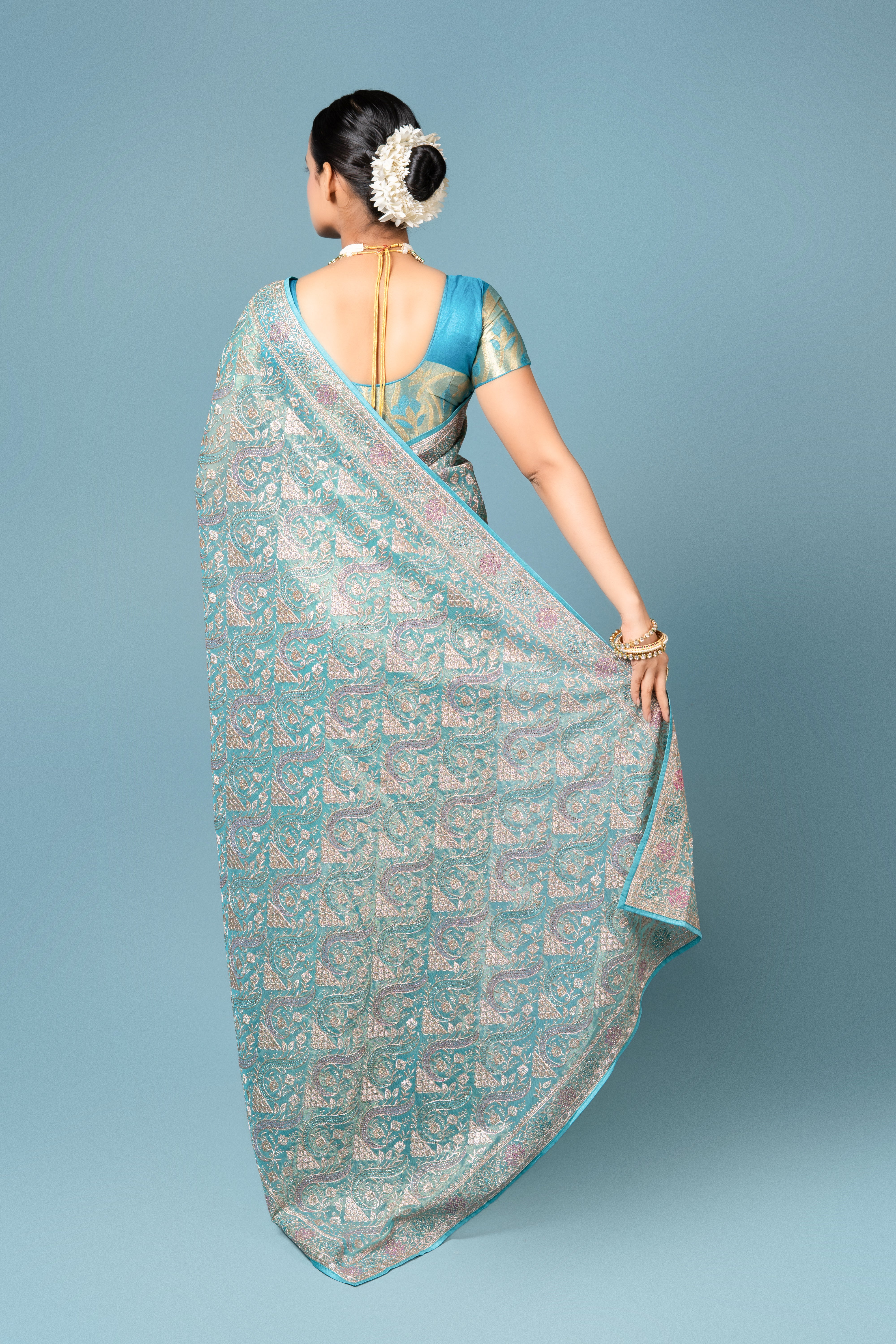 Turquoise Georgette Saree With Stone Work