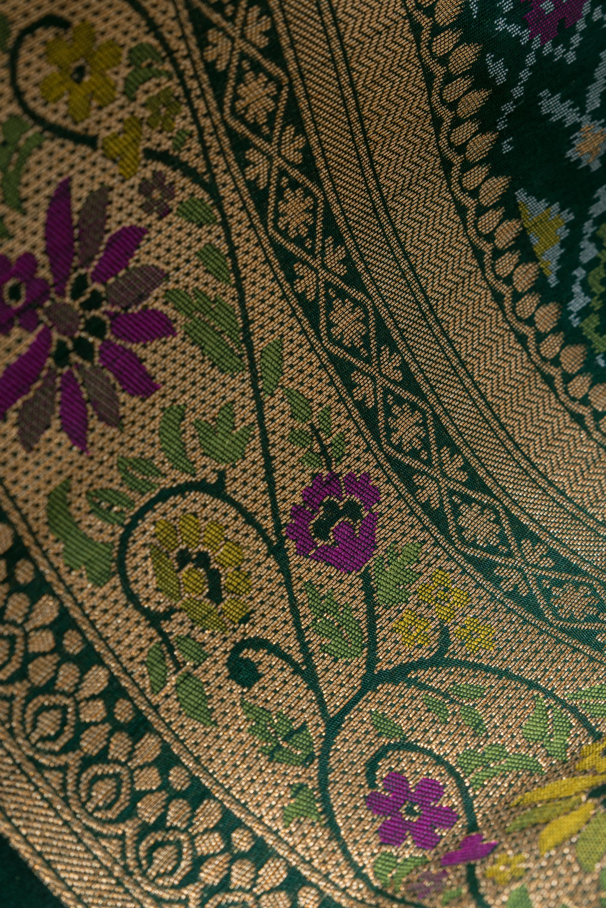 Forest Green Tussar Silk Patola Saree with Resham Threadwork Pallu