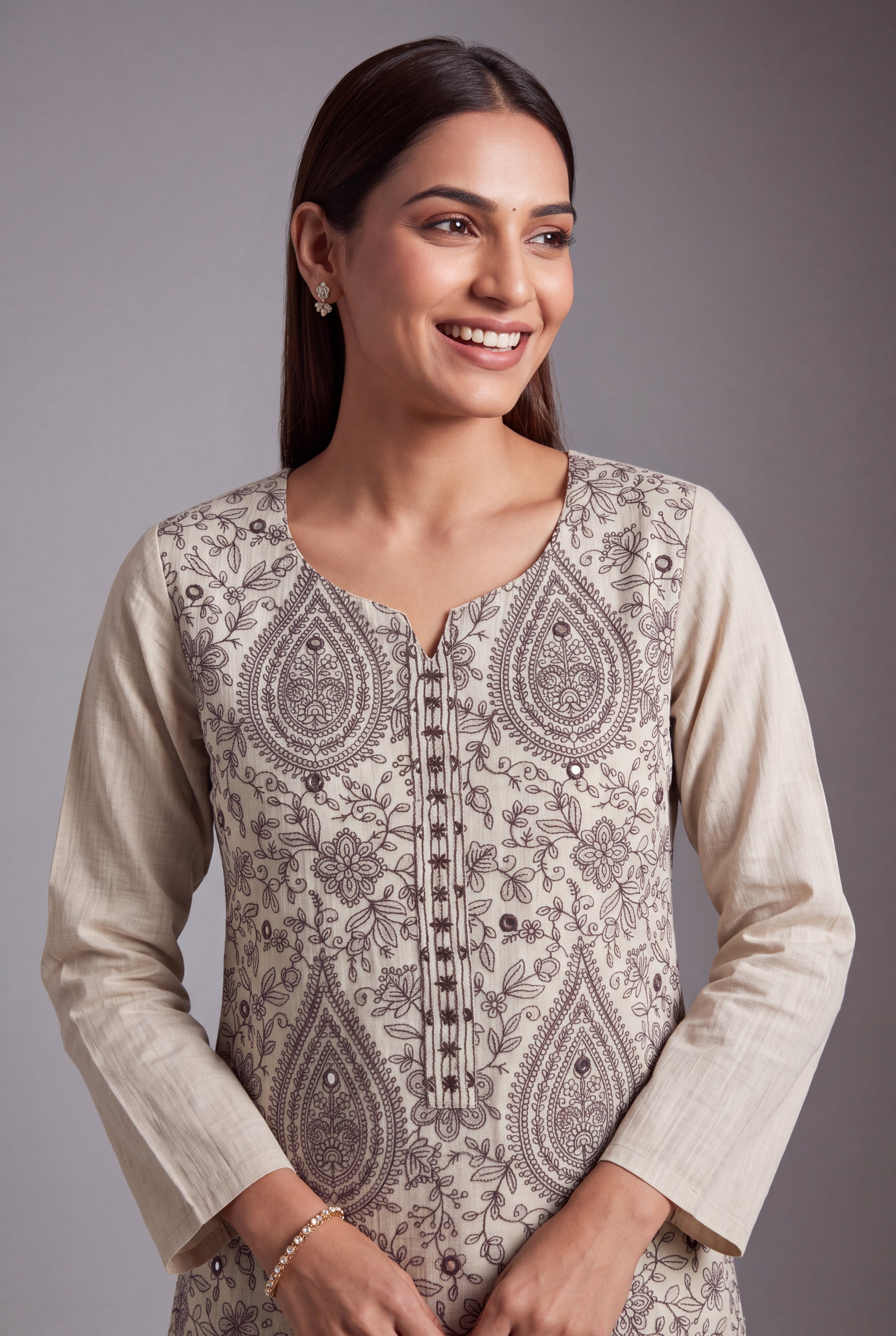 Cream Aranya Kurti with Brown Netrabindu and Jaal threadwork