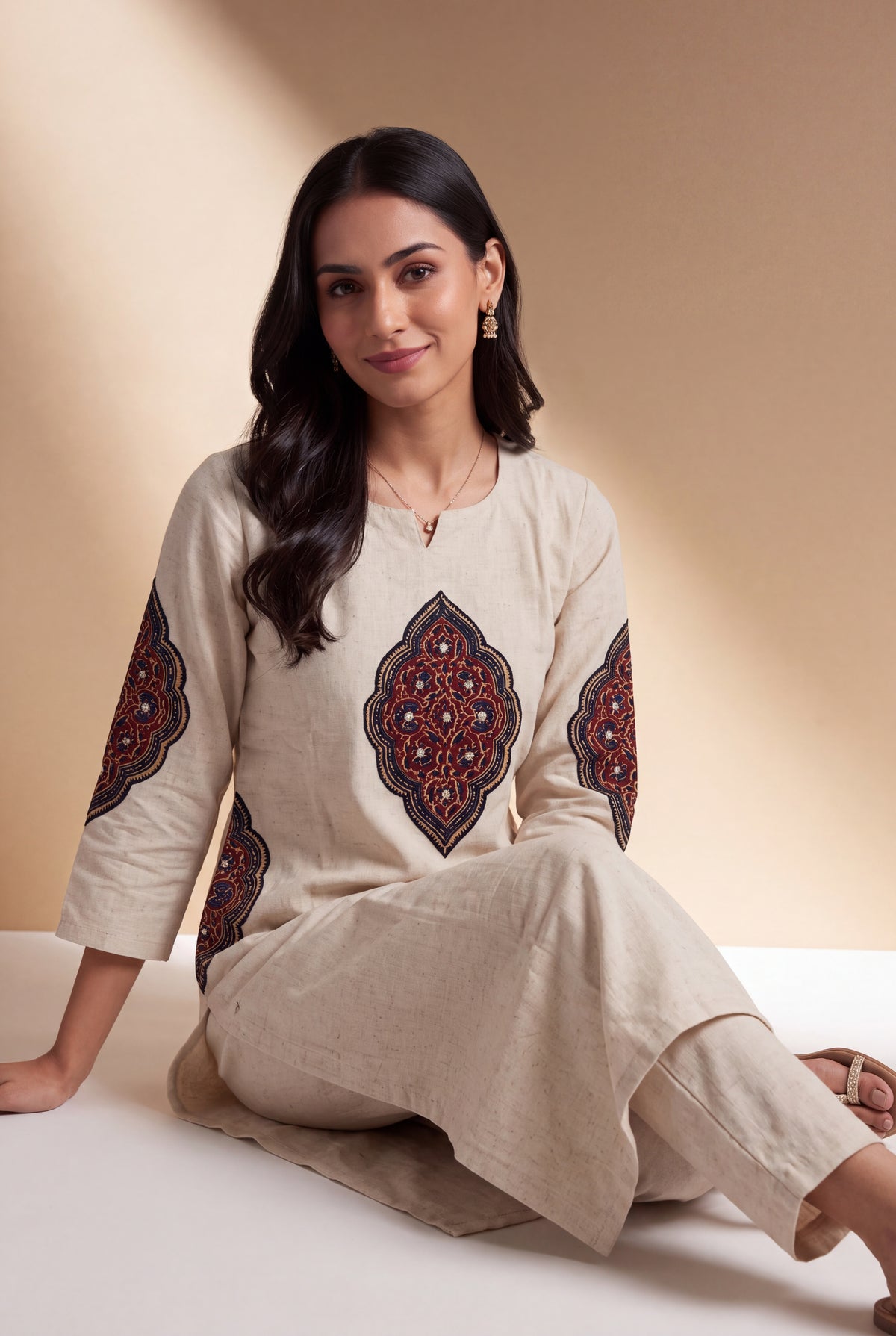 Cream Khadi Cotton Black Padakāvalī Kurti with Mirrorwork