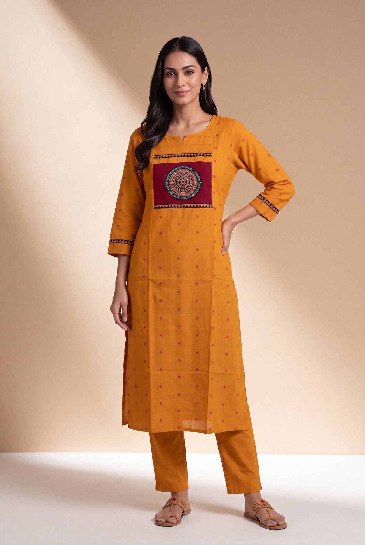Mustard Cotton Kurti with Rust Butti and Chakrāvalī Patchwork