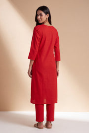 Rusty Red Cotton Kurti with White Dot Threadwork and Vāṭikāvalī Appliqué
