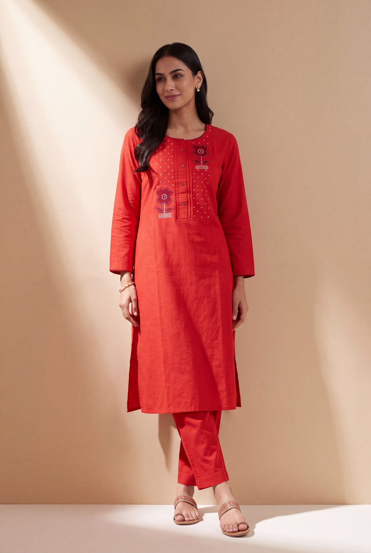 Rusty Red Cotton Kurti with White Dot Threadwork and Vāṭikāvalī Appliqué
