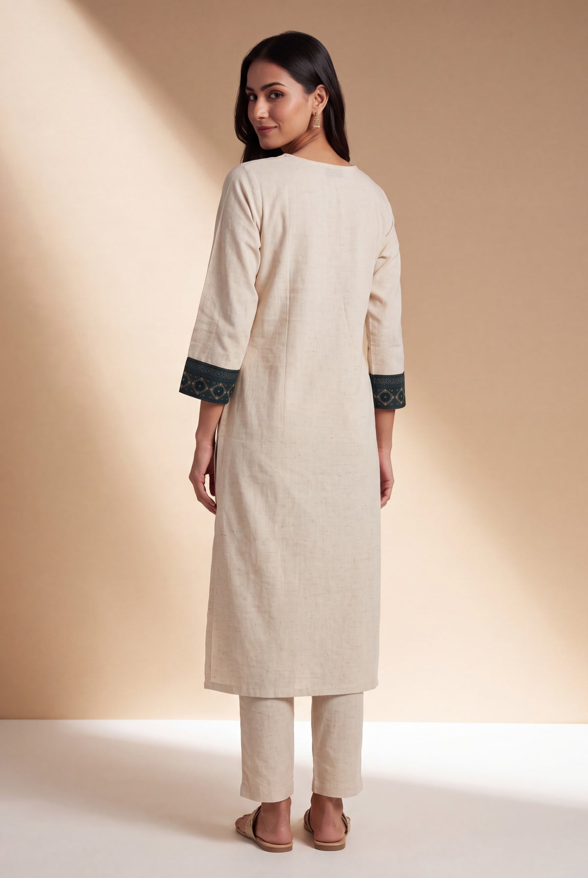 Cream Khadi Cotton Kurti with Teal Patchwork Cuffs and Vajrāvalī Yoke
