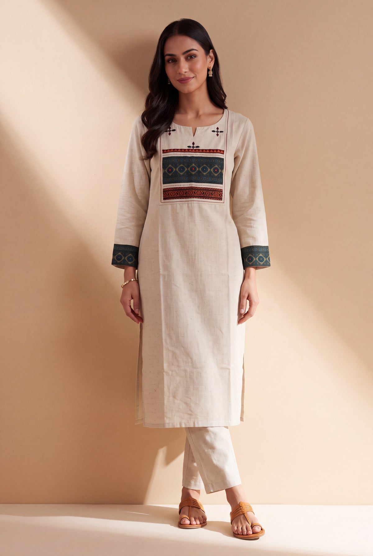 Cream Khadi Cotton Kurti with Teal Patchwork Cuffs and Vajrāvalī Yoke