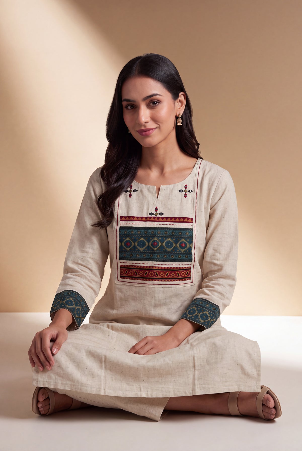 Cream Khadi Cotton Kurti with Teal Patchwork Cuffs and Vajrāvalī Yoke