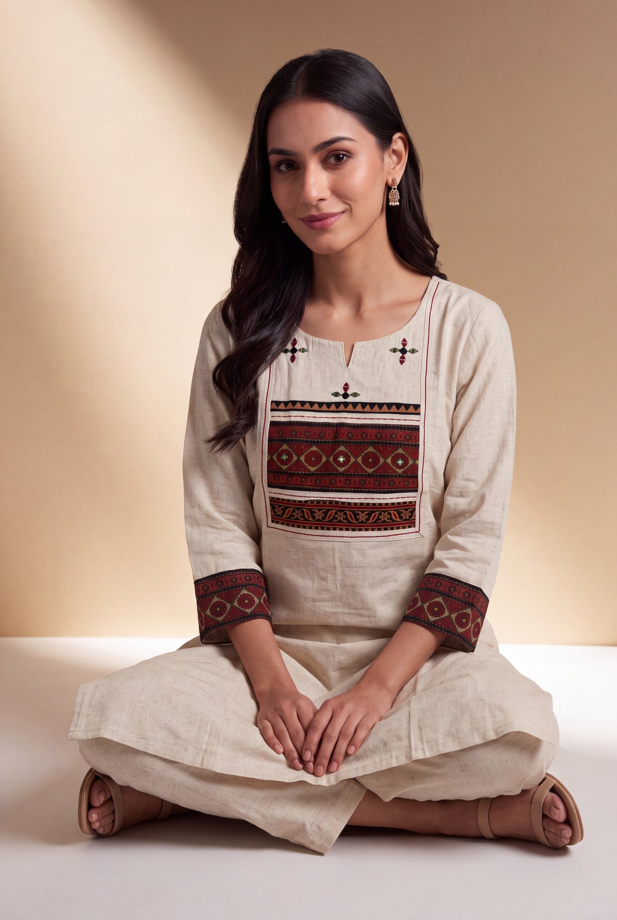 Cream Khadi Cotton Kurti with Rose Patchwork Cuffs and Vajrāvalī Yoke