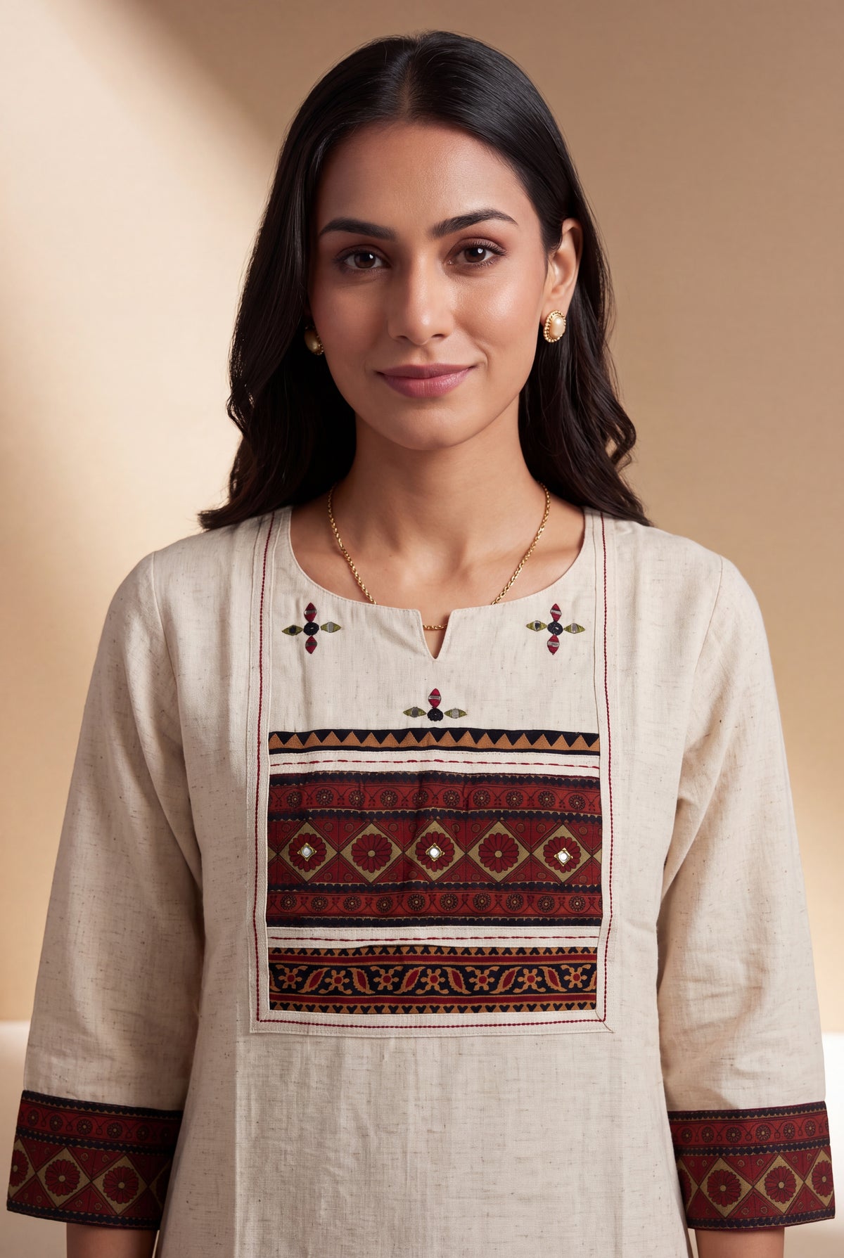 Cream Khadi Cotton Kurti with Rose Patchwork Cuffs and Vajrāvalī Yoke