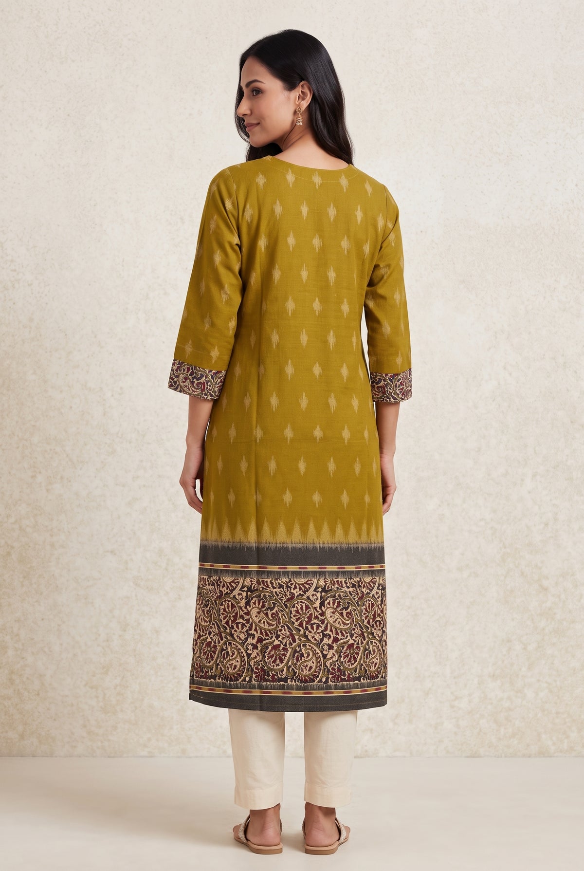 Mustard Yellow Madras Cotton Kurti with Kalamkari Border and Ikat print