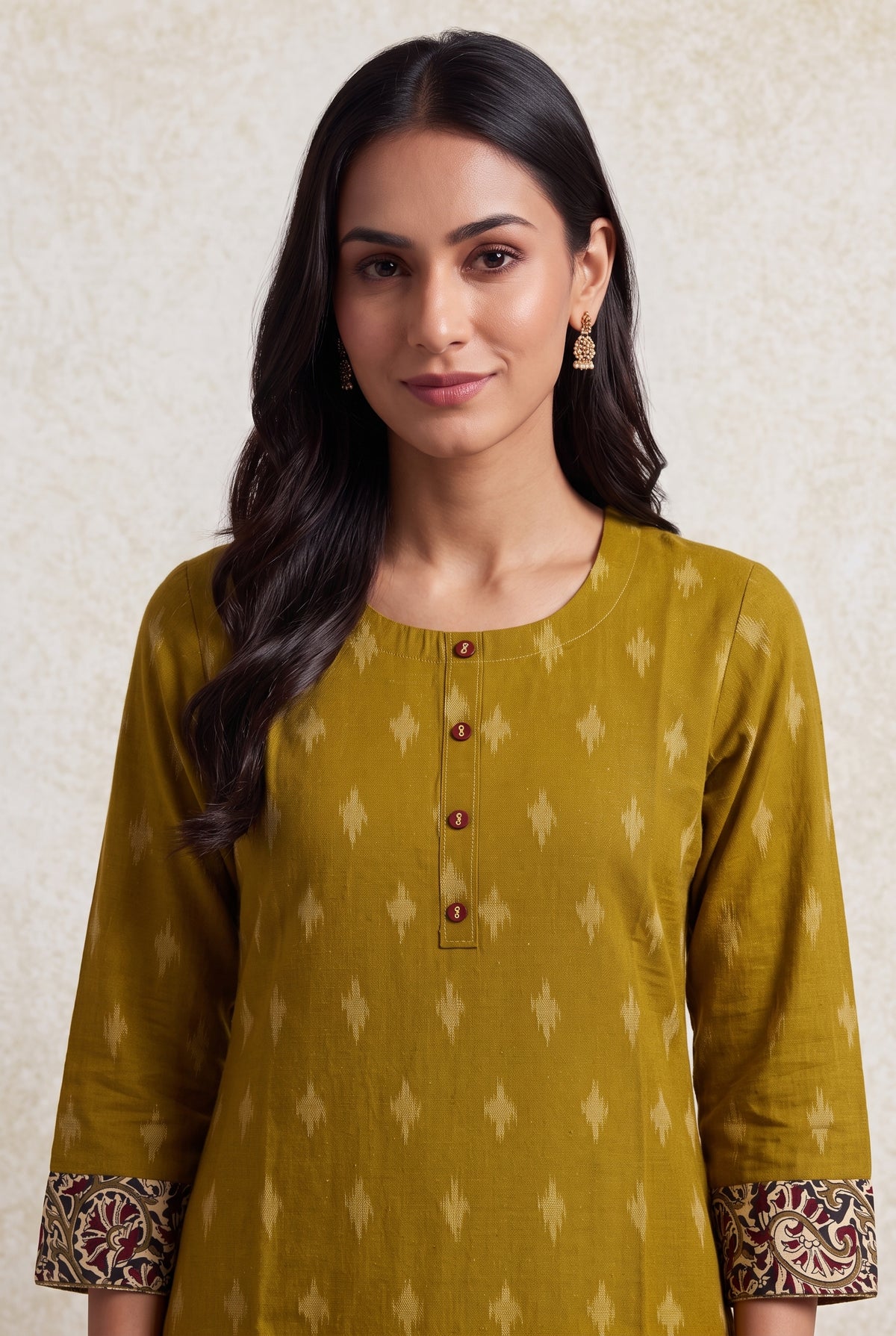 Mustard Yellow Madras Cotton Kurti with Kalamkari Border and Ikat print
