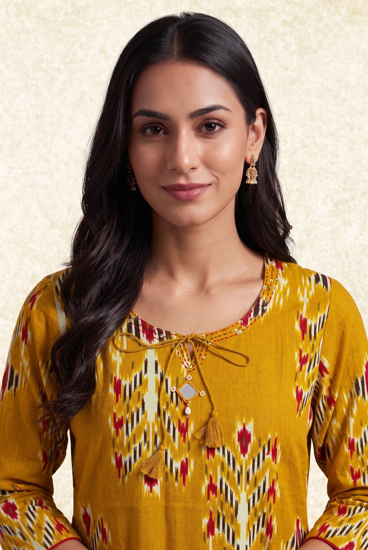 Haldi Yellow Cotton Kurti with Rani Pink Ikat-inspired motifs