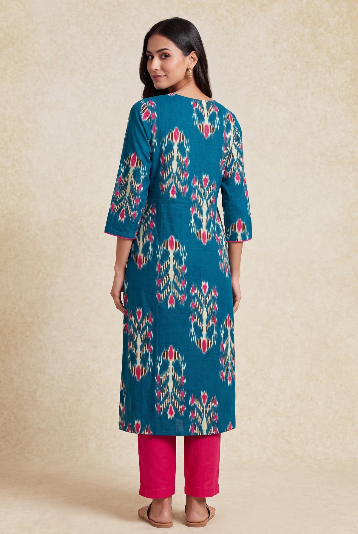 Peacock Blue Cotton Kurti with Rani Pink Ikat-inspired motifs