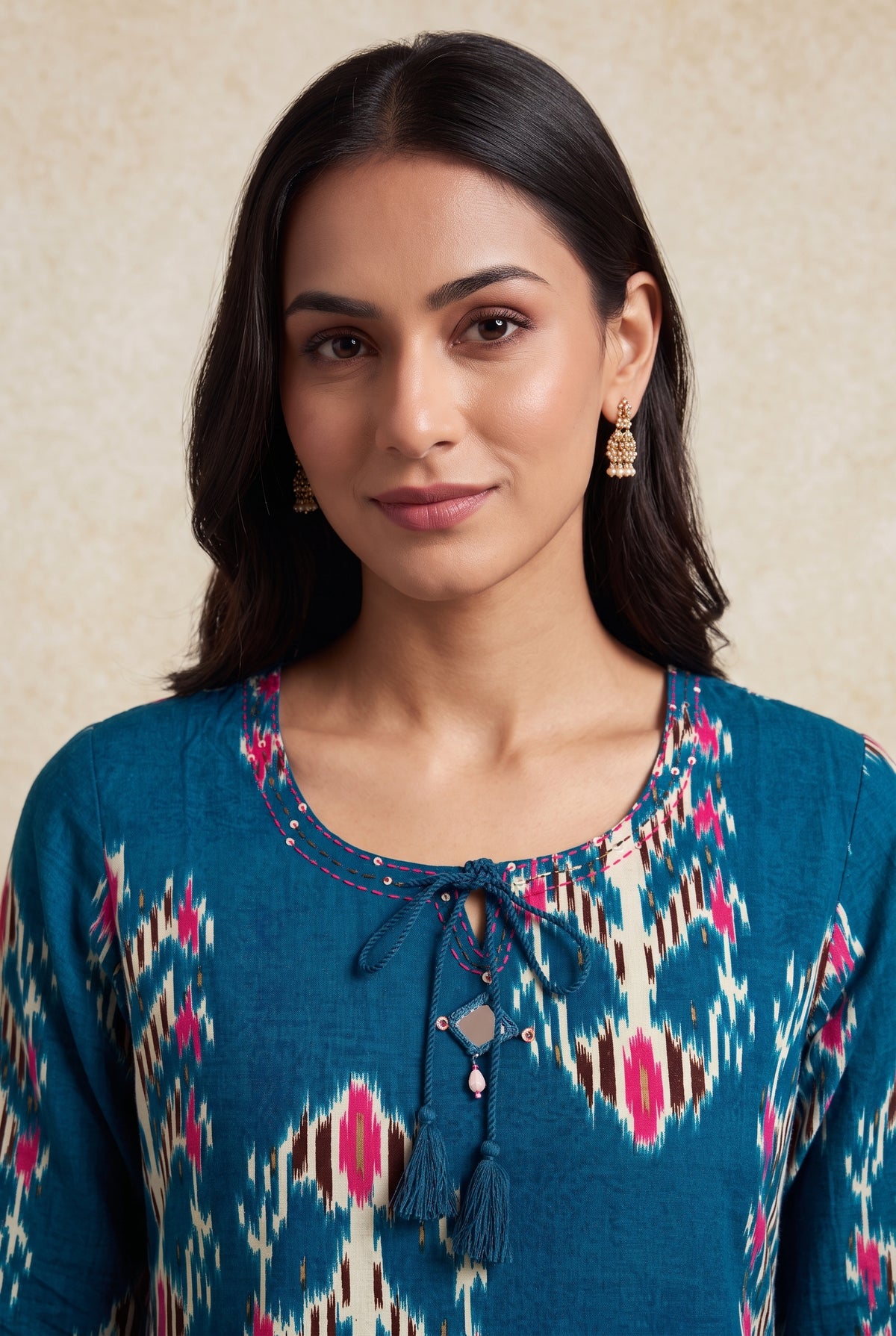 Peacock Blue Cotton Kurti with Rani Pink Ikat-inspired motifs