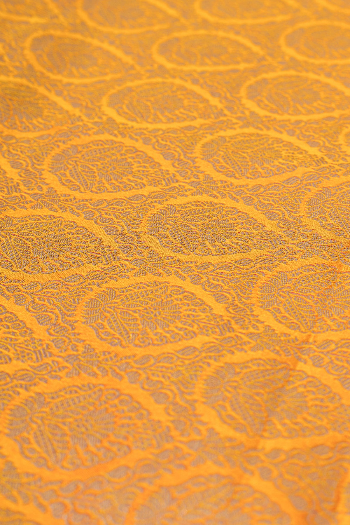 Mustard Yellow Katan Silk Banarasi Saree with Embossed Rani Pink Floral weave