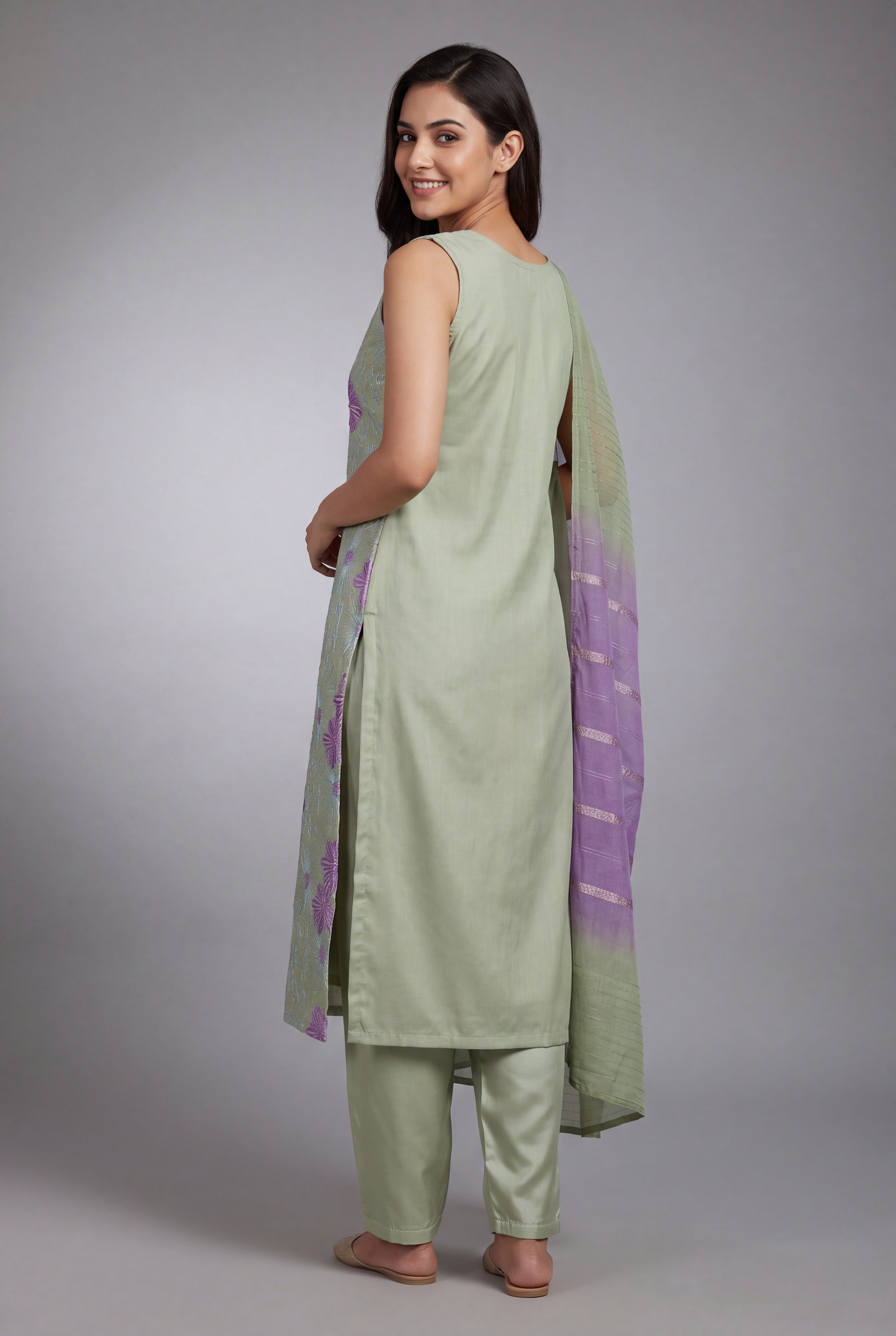 Pistachio Green Soft Silk Suit Set with Śyāmapuṣpa threadwork and Sequin work