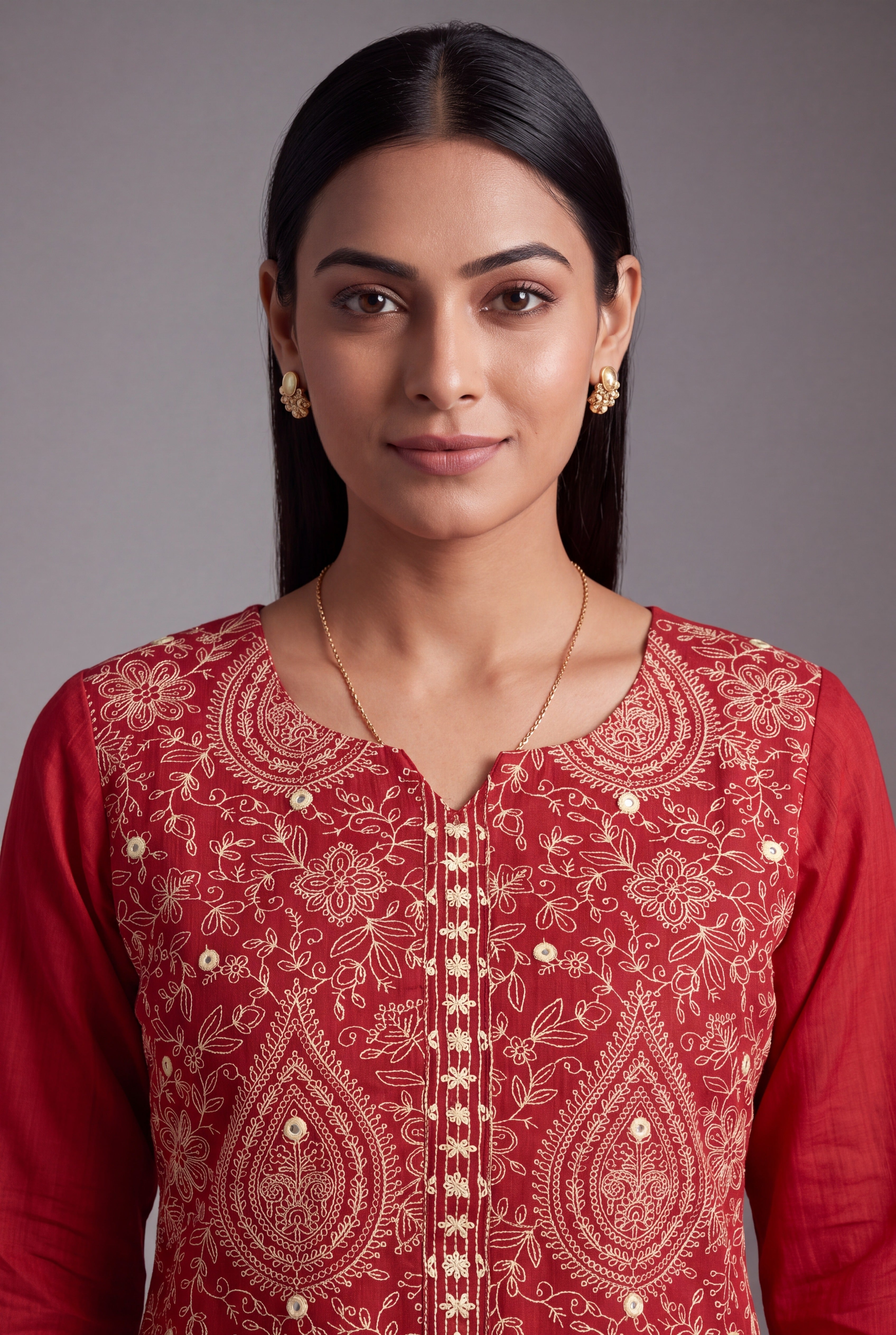 Rust Araṇya Kurti with Cream Netrabindu and Jaal threadwork