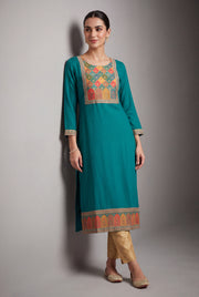 Turquoise Cārumatī Kurti with Floral Tissue Print
