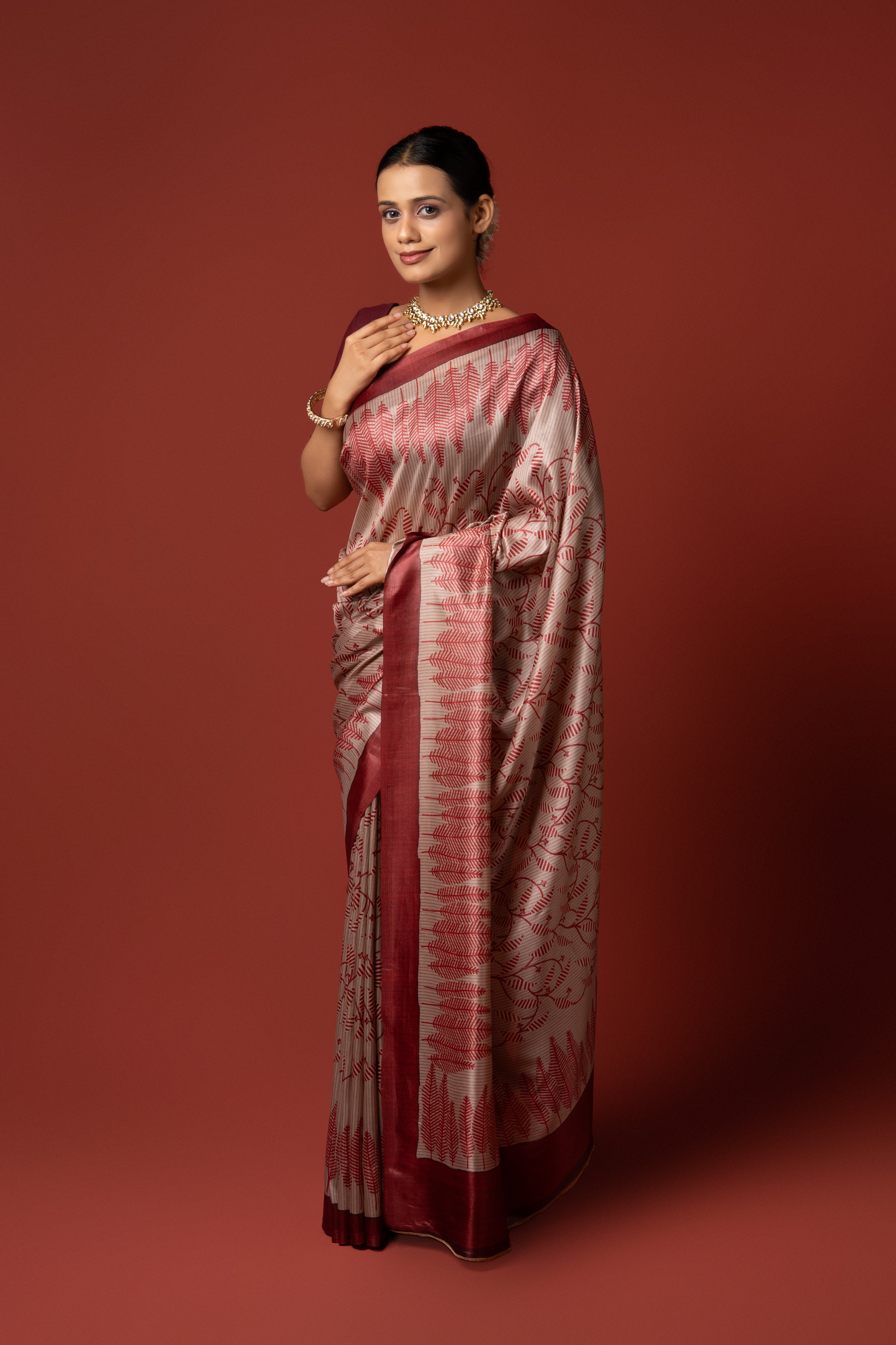 Beige And Red Crepe Silk Saree